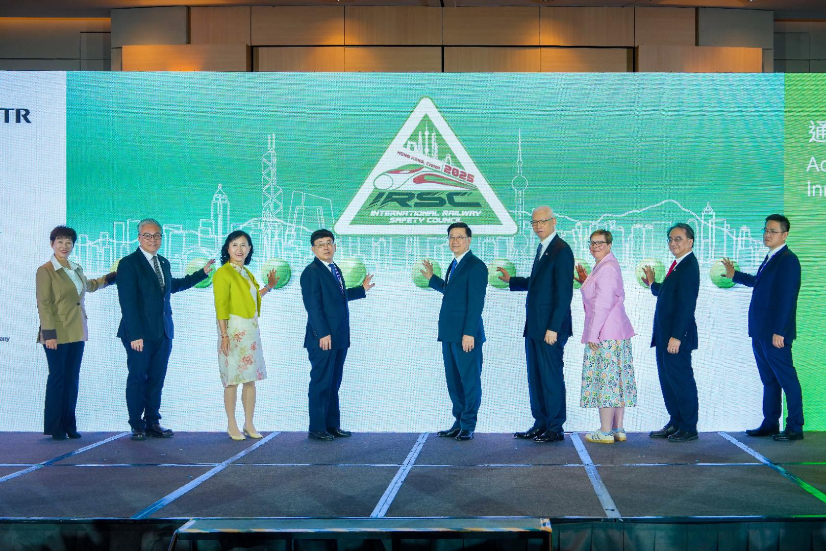 The 35th International Railway Safety Council Annual Conference (IRSC) commenced in Hong Kong today (November 26). Photo shows the Chief Executive, Mr John Lee (centre); Deputy Administrator of the National Railway Administration Mr Wang Qiming (fourth left); the Chairman of the Mass Transit Railway Corporation Limited (MTRCL), Dr Rex Auyeung (fourth right); the Secretary for Transport and Logistics, Ms Mable Chan (third left); the Secretary of the IRSC Core Group, Ms Ann Mills (third right); the Director of Electrical and Mechanical Services, Mr Raymond Poon (second left); the Chief Executive Officer of the MTRCL, Dr Jacob Kam (second right); Deputy Director-General of the Safety Supervision and Management Bureau of China Railway Mr Wang Zhi (first right); and the President of the Hong Kong Institution of Engineers, Ms Alice Chow (first left), at the opening ceremony.