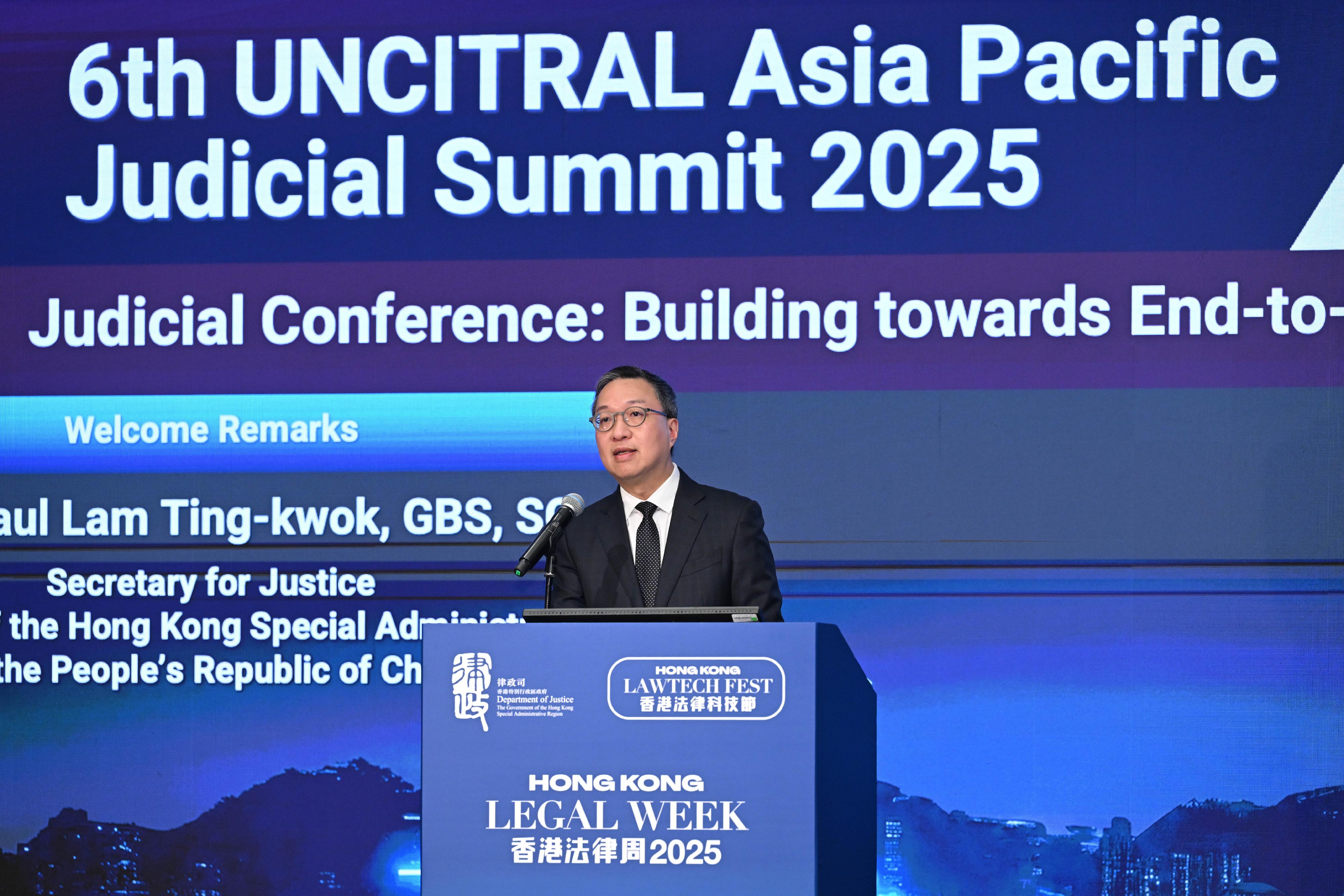 The Secretary for Justice, Mr Paul Lam, SC, delivers welcome remarks at the 6th UNCITRAL Asia Pacific Judicial Summit - Judicial Conference under Hong Kong Legal Week 2025 today (December 1).