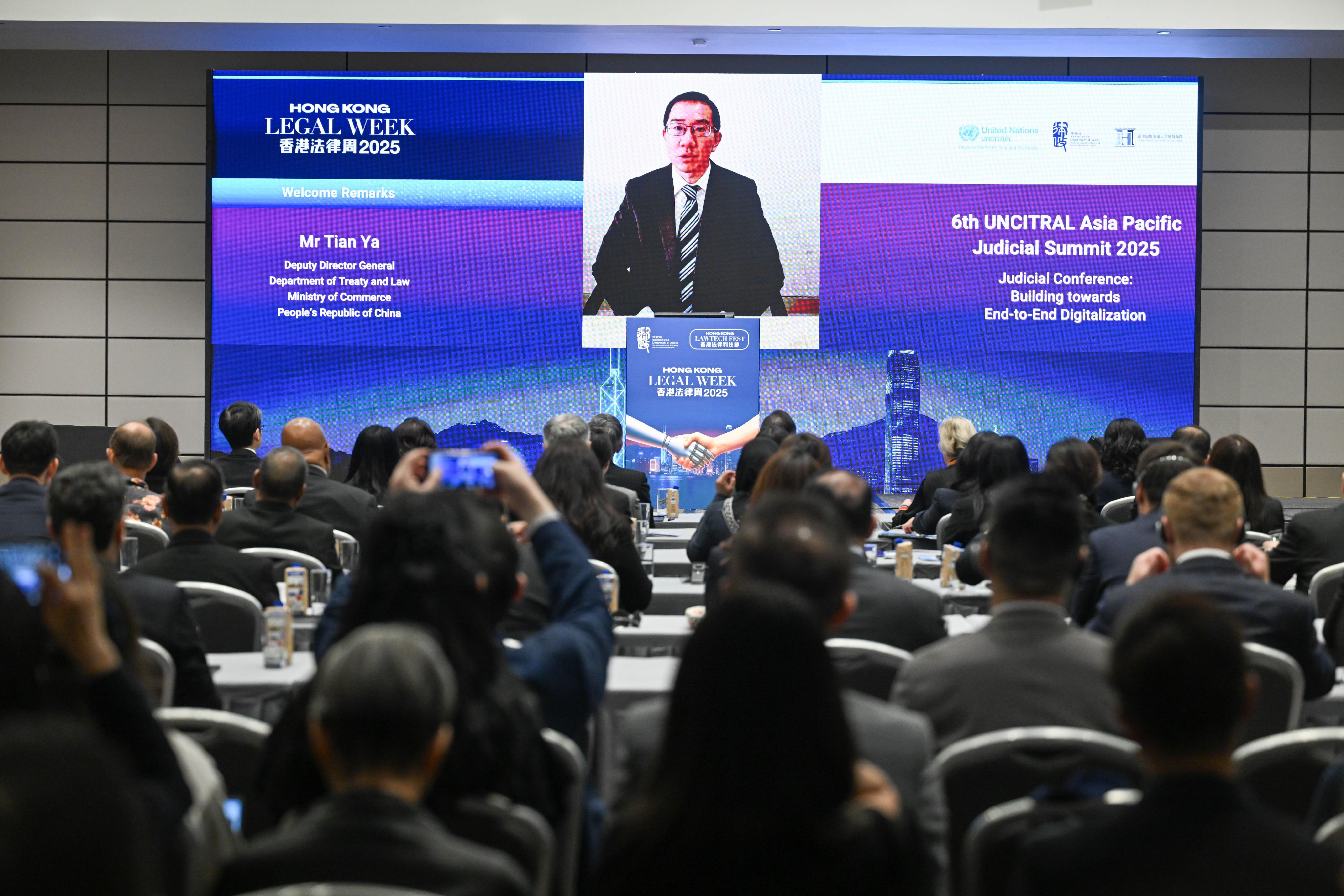 The Deputy Director-General of the Department of Treaty and Law of the Ministry of Commerce of the People’s Republic of China, Mr Tian Ya, delivers welcome remarks by video at the 6th UNCITRAL Asia Pacific Judicial Summit 2025 - Judicial Conference under Hong Kong Legal Week 2025 today (December 1).