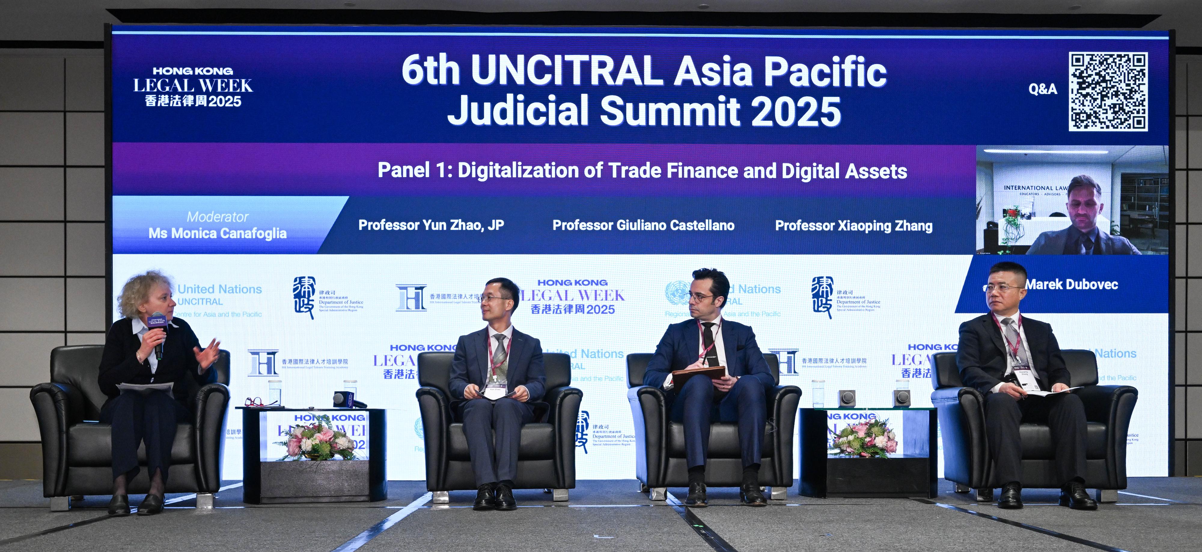 The five-day Hong Kong Legal Week 2025, themed "Linking Laws, Bridging Worlds" began today (December 1). Photo shows (from left) Legal Officer of the United Nations Commission on International Trade Law, Ms Monica Canafoglia; Henry Cheng Professor in International Law and Associate Dean (Mainland Affairs) of Faculty of Law of the University of Hong Kong, Professor Zhao Yun; Associate Professor and the Director of the Asian Institute of International Financial Law at the Faculty of Law of the University of Hong Kong, Professor Giuliano Castellano; Associate Professor of Law of the Central University of Finance and Economics, Professor Zhang Xiaoping; and the Director of Law Reform Programs of the International Law Institute, Dr Marek Dubovec, at panel session 1 on Digitalization of Trade Finance and Digital Assets at the 6th UNCITRAL Asia Pacific Judicial Summit 2025 - Judicial Conference.