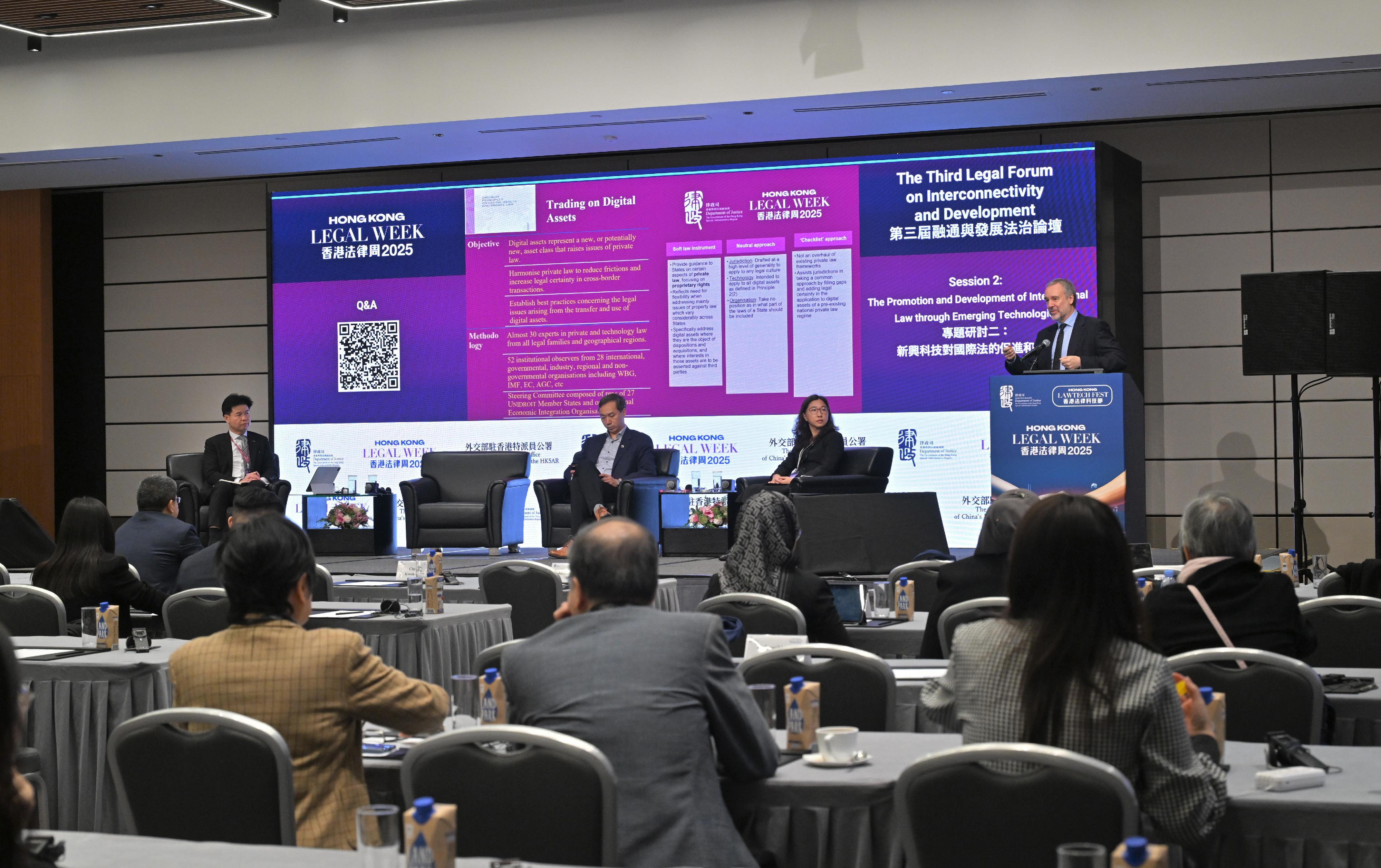 The Third Legal Forum on Interconnectivity and Development was held today (December 2). Photo shows (from left) the President of the Law Society of Hong Kong, Mr Roden Tong; the Vice-President and Pro-Vice-Chancellor (Business) of the University of Hong Kong, Professor Lin Chen; Associate Professor of the Law School of the Central University of Finance and Economics Professor Wu Xiaodan; and the Secretary-General of the International Institute for the Unification of Private Law, Professor Ignacio Tirado, at Session 2 on The Promotion and Development of International Law through Emerging Technologies.