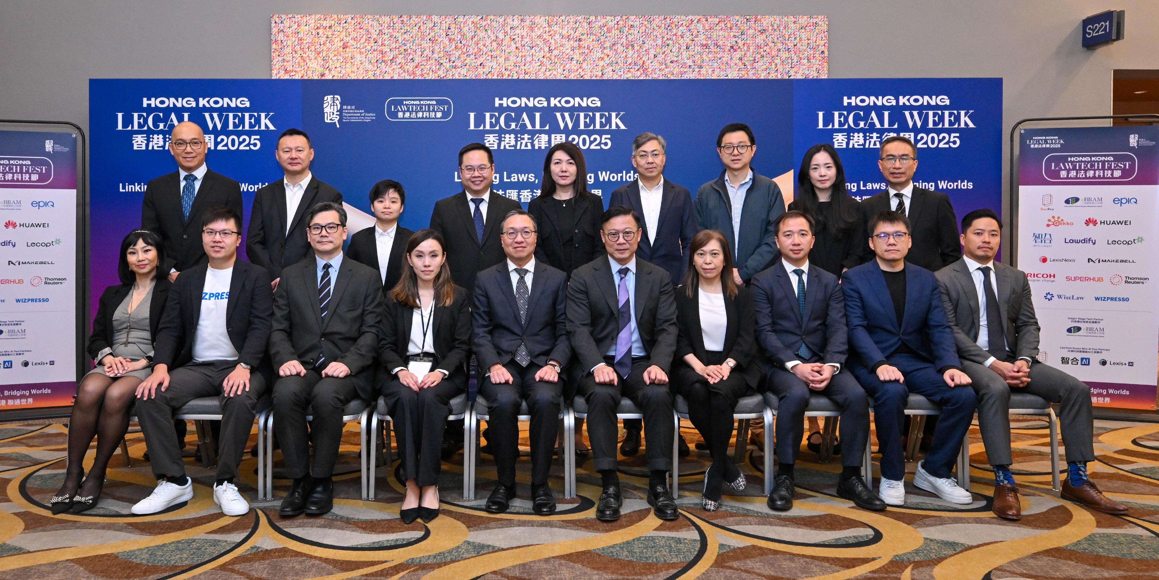 The Department of Justice is holding the first Hong Kong LawTech Fest 2025 during the Hong Kong Legal Week 2025. Photo shows the Secretary for Justice, Mr Paul Lam, SC (front row, fifth left), and the Deputy Secretary for Justice, Dr Chueng Kwok-kwan (front row, fifth right), and representatives of the exhibitors of Hong Kong LawTech Fest 2025.