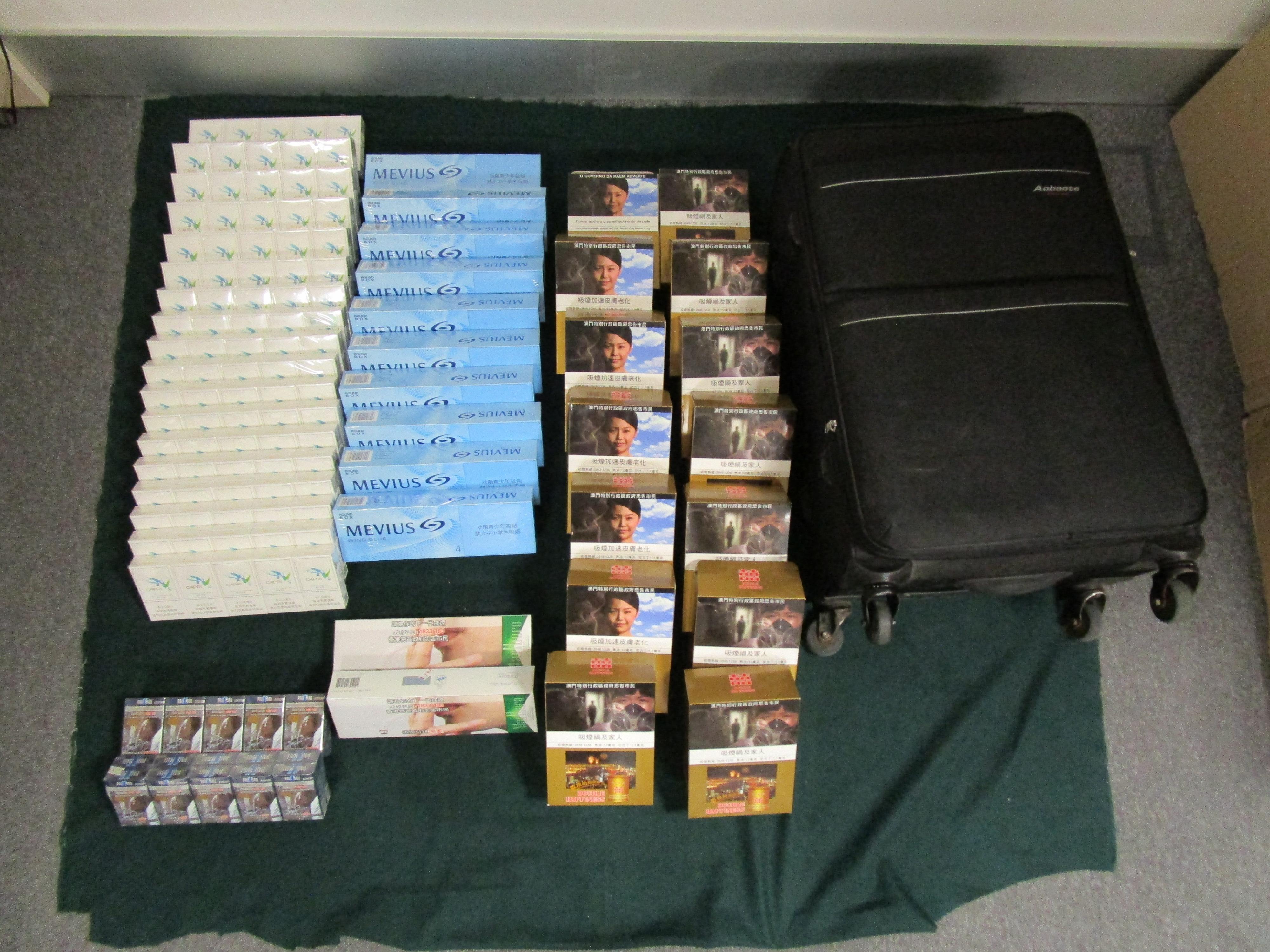 A 60-year-old incoming male passenger was sentenced to 50 days' imprisonment and fined $1,000 by the West Kowloon Magistrates' Courts today (December 5) for possessing duty-not-paid cigarettes and failing to declare them to Customs officers, in contravention of the Dutiable Commodities Ordinance. Photo shows the duty-not-paid cigarettes seized.
