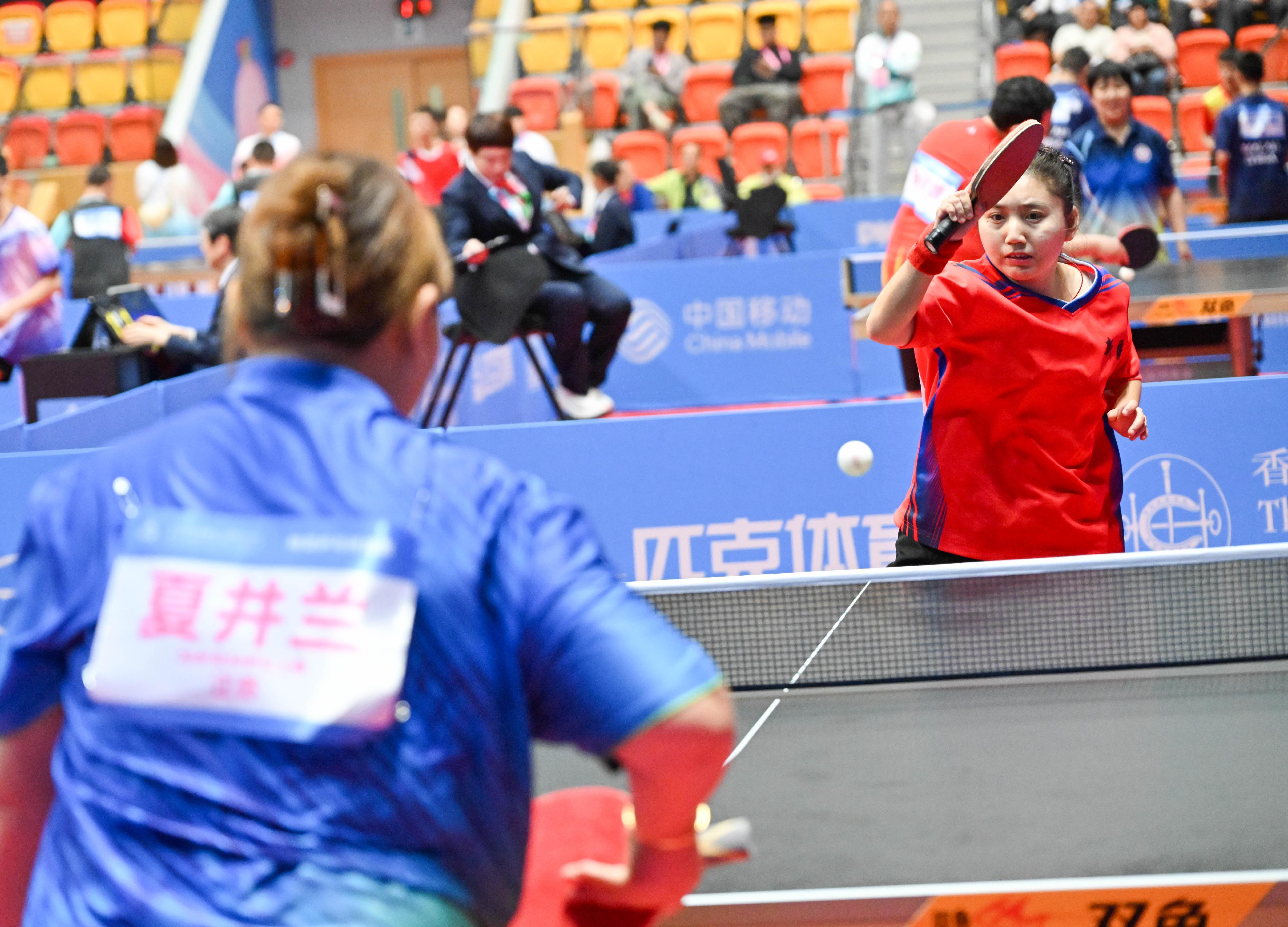 The National Special Olympic Games table tennis competition of the 12th National Games for Persons with Disabilities and the 9th National Special Olympic Games was held today (December 9) at Tsuen Wan Sports Centre. Photo shows athletes competing in the women’s singles event.