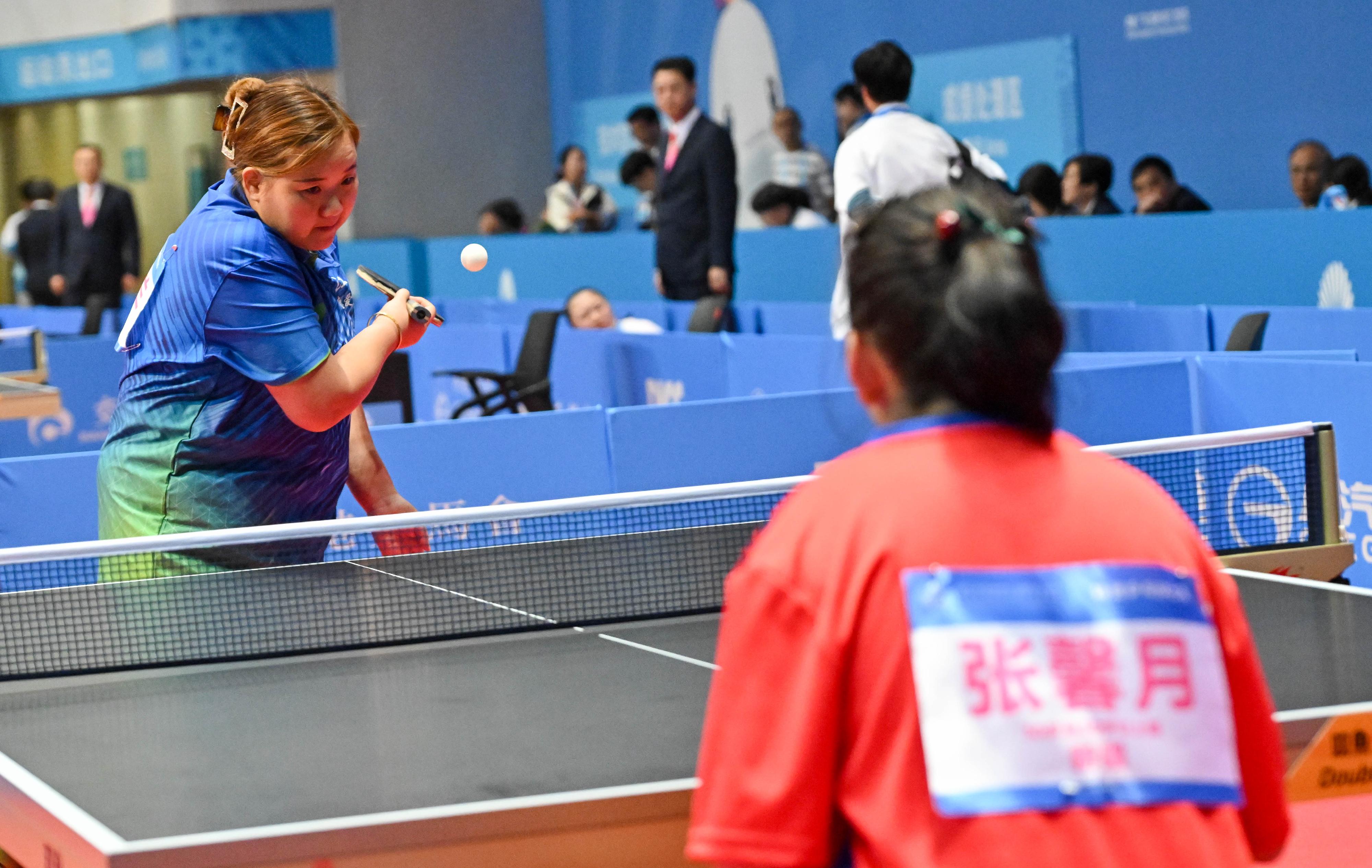 The National Special Olympic Games table tennis competition of the 12th National Games for Persons with Disabilities and the 9th National Special Olympic Games was held today (December 9) at Tsuen Wan Sports Centre. Photo shows athletes competing in the women’s singles event.