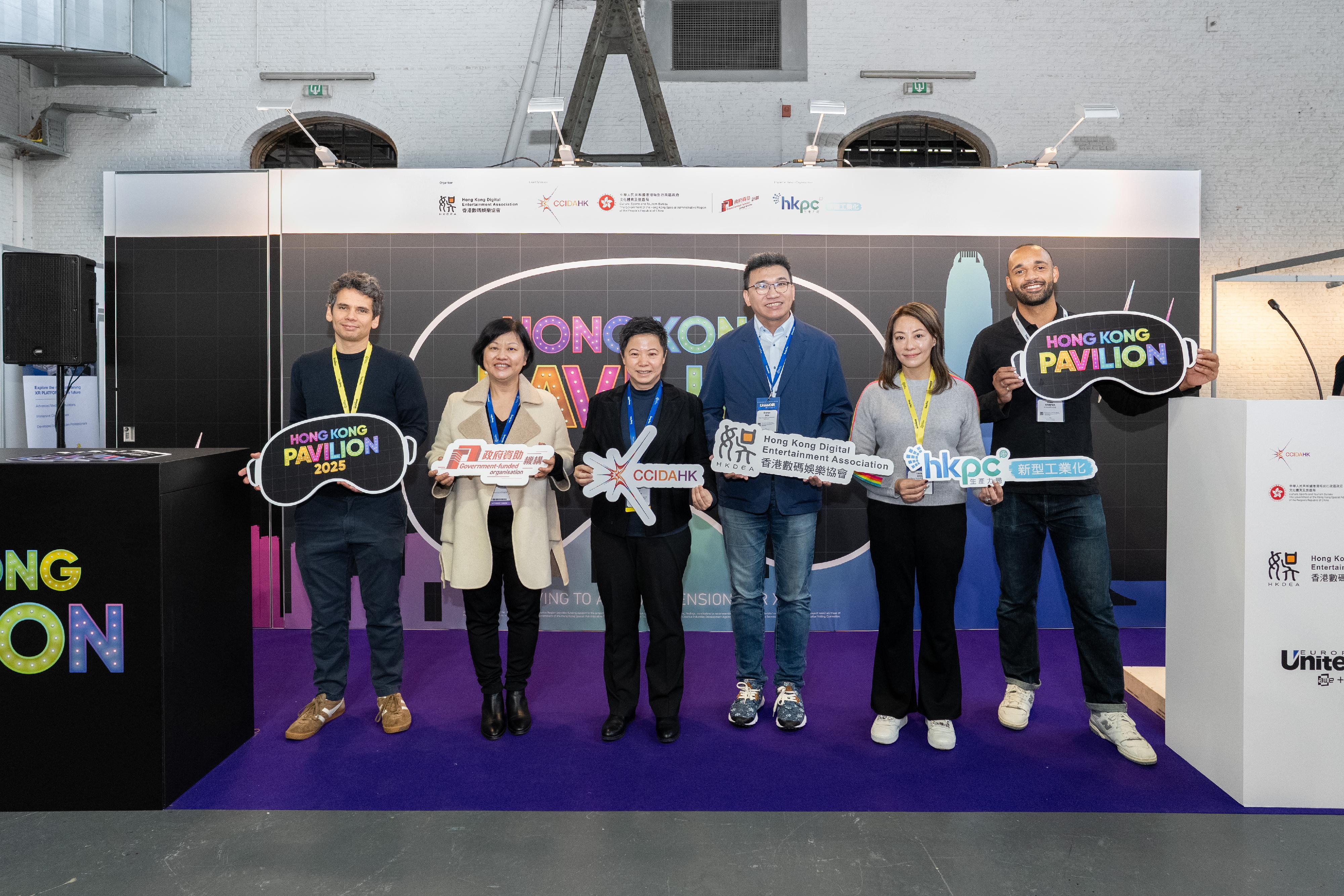 The Cultural and Creative Industries Development Agency under the Culture, Sports and Tourism Bureau led an industry delegation to participate in UnitedXR Europe 2025 in Brussels, Belgium, from December 8 to 10 (Brussels time). Photo shows the Commissioner for Cultural and Creative Industries, Miss Drew Lai (third left), the Special Representative for Hong Kong Economic and Trade Affairs to the European Union, Ms Shirley Yung (second left), representatives of the organiser and other officiating guests at the opening ceremony of the Hong Kong Pavilion.
