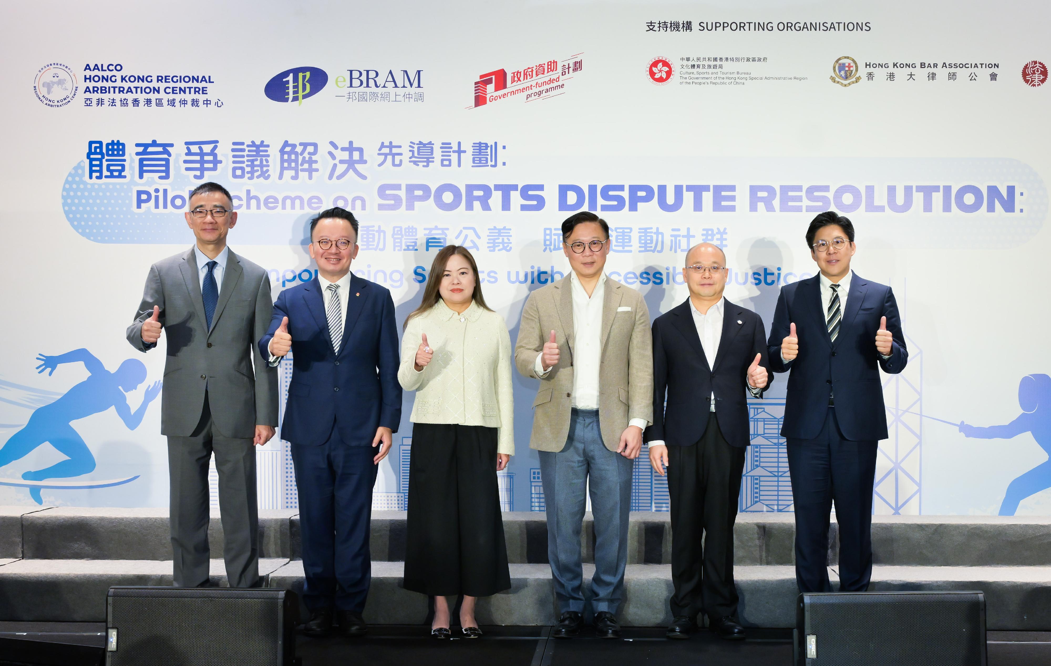 The launching ceremony of the Pilot Scheme on Sports Dispute Resolution was held today (December 11). Photo shows the Deputy Secretary for Justice and Chairperson of the Advisory Committee on Sports Dispute Resolution, Dr Cheung Kwok-kwan (third right); the Secretary for Culture, Sports and Tourism, Miss Rosanna Law (third left); the Director-General of the Department of Law of the Liaison Office of the Central People's Government in the Hong Kong Special Administrative Region, Mr Liu Chunhua (second right); the Director of the AALCO Hong Kong Regional Arbitration Centre, Mr Nick Chan (second left); the Chairman of the eBRAM International Online Dispute Resolution Centre, Dr Thomas So (first left); and the Vice-President of the Sports Federation & Olympic Committee of Hong Kong, China, Mr Kenneth Fok (first right), at the ceremony.