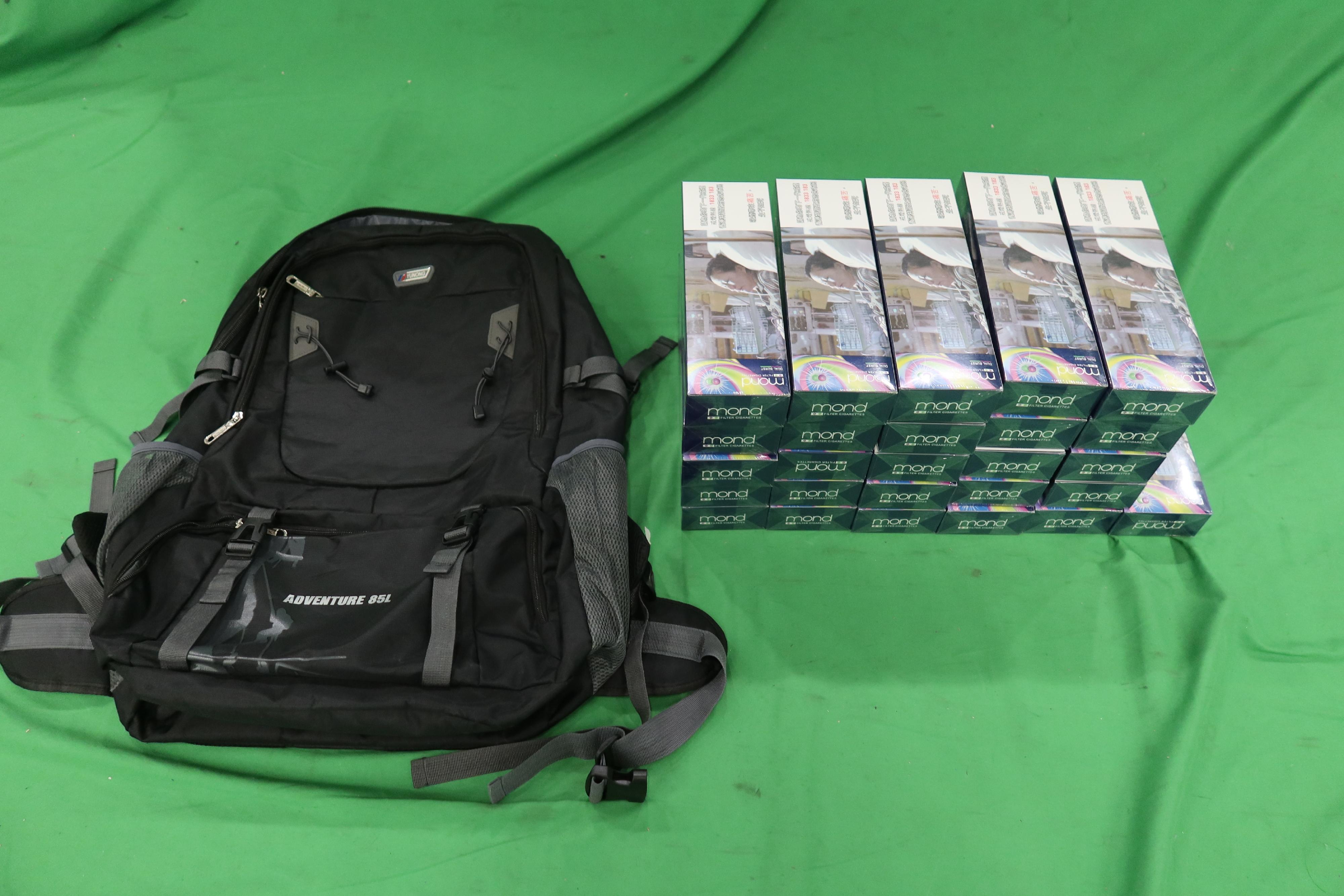 A 21-year-old incoming male passenger was sentenced to two months' imprisonment and fined $1,000 at the West Kowloon Magistrates' Courts today (December 12) for possessing duty-not-paid cigarettes and failing to declare them to Customs officers, in contravention of the Dutiable Commodities Ordinance. Photo shows the duty-not-paid cigarettes seized.