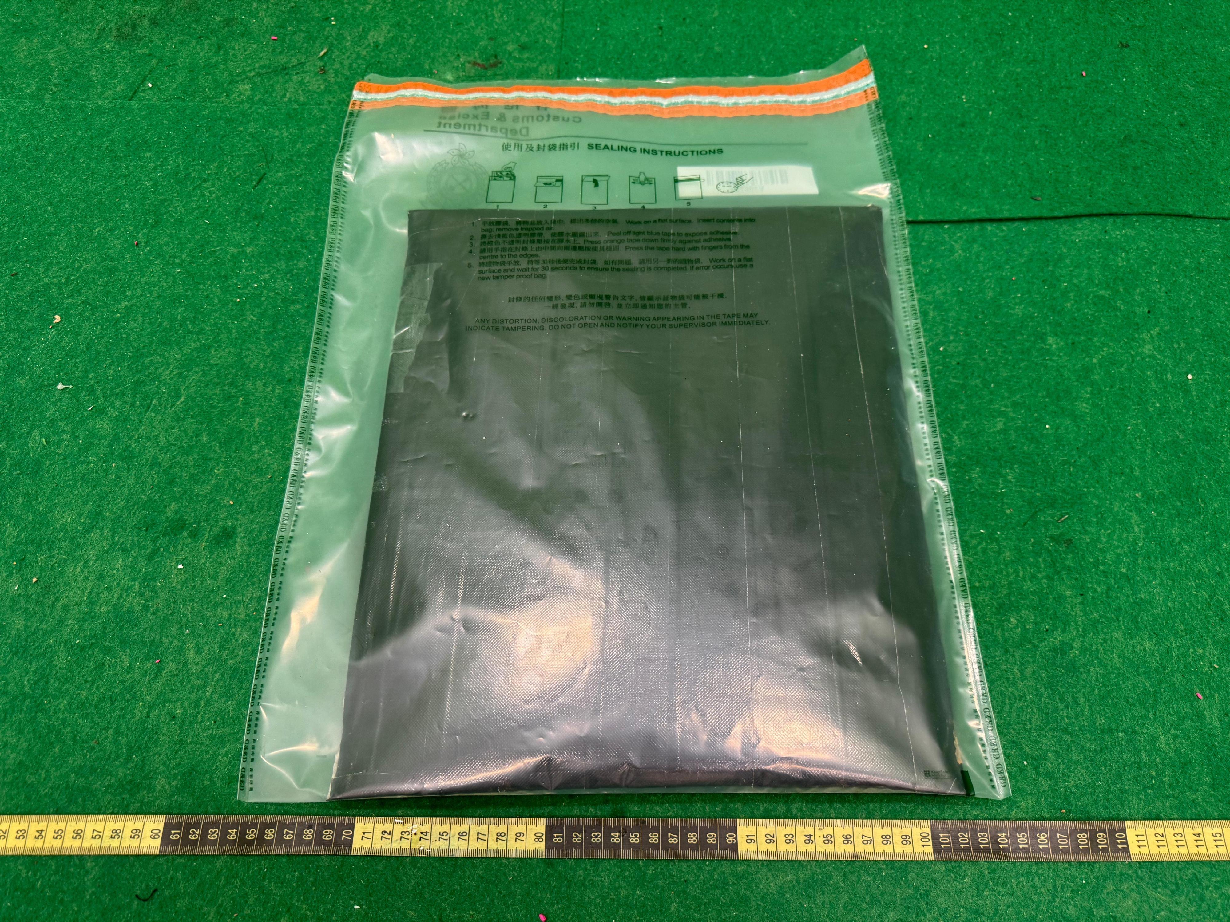 Hong Kong Customs detected a trafficking case involving air cargo and a drug trafficking case involving a passenger at Hong Kong International Airport, and shut down a suspected dangerous drugs distribution centre in Tai Po, seizing a total of about 15 kilograms of suspected ketamine, 1kg of suspected cannabis buds, 40 capsules of suspected etomidate, 660 grams of suspected liquid etomidate, 8g of suspected cannabis oil and 1.7kg of suspected heroin, with a total estimated market value of about $8.9 million. Three males were arrested. Photo shows the suspected heroin seized in the second case.