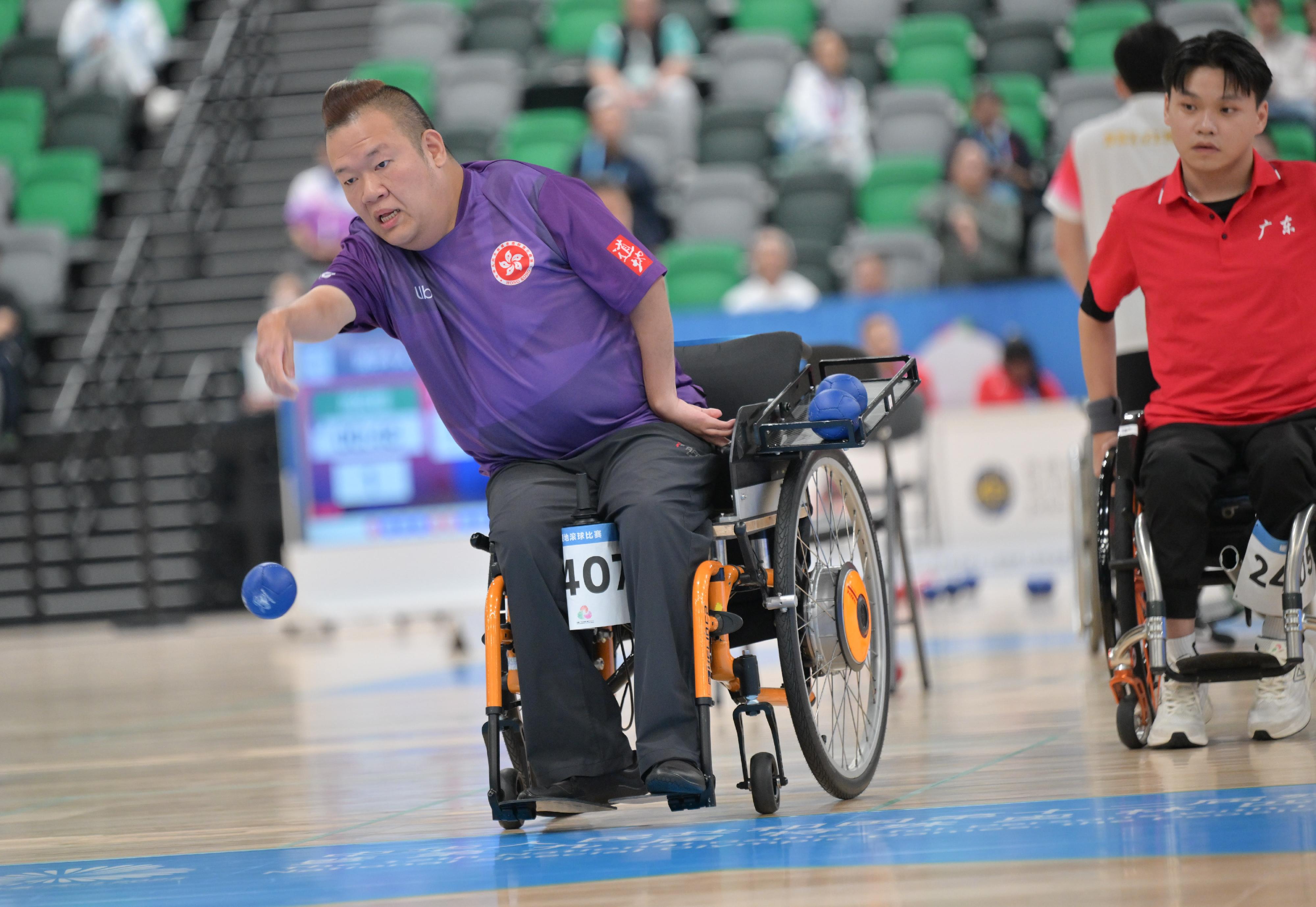 The individual finals of the boccia competition of the 12th National Games for Persons with Disabilities and the 9th National Special Olympic Games was held at Kai Tak Arena, Kai Tak Sports Park today (December 12). Photo shows Hong Kong athlete Leung Yuk-wing competing in the Men's Individual BC4 event.
