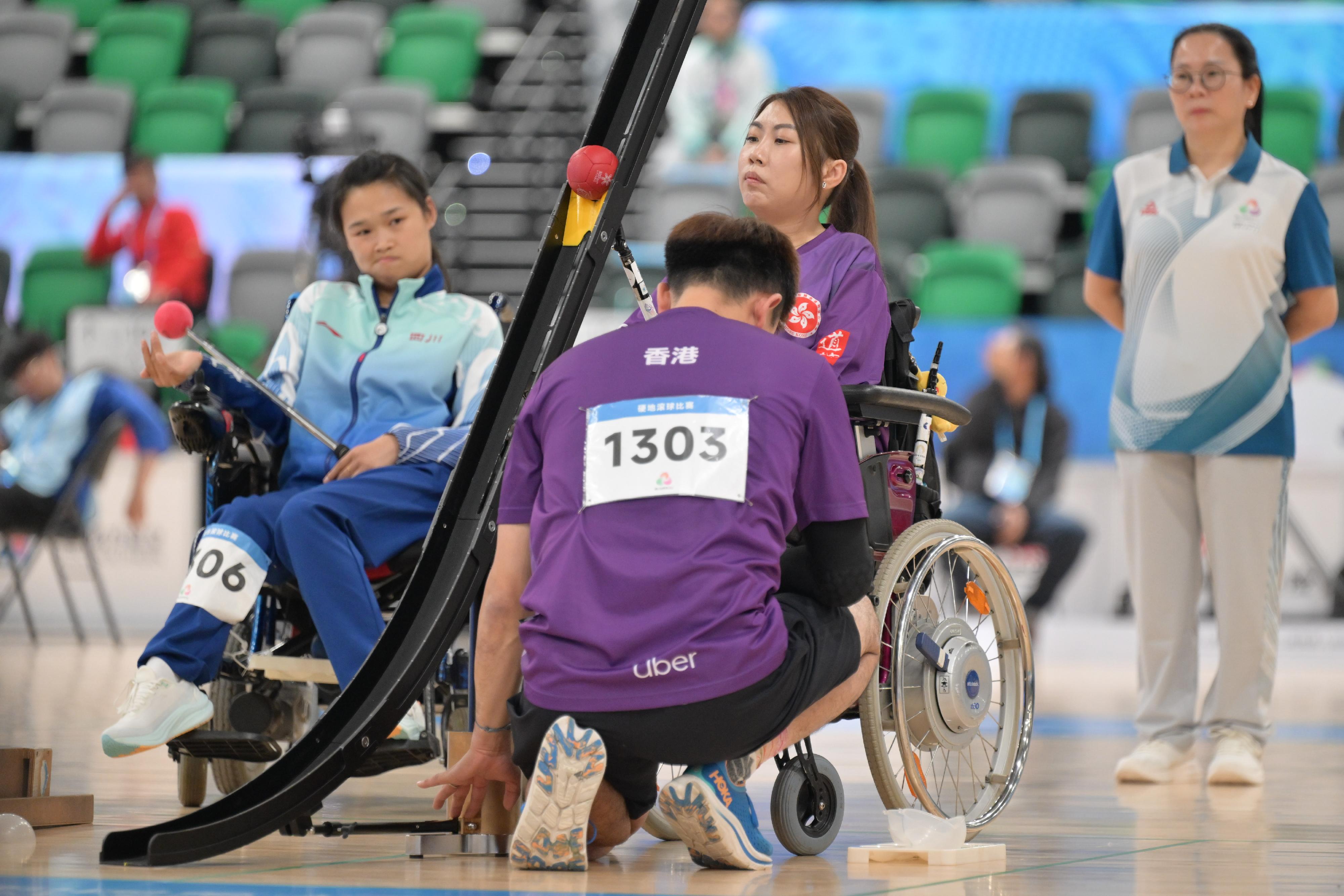 The individual finals of the boccia competition of the 12th National Games for Persons with Disabilities and the 9th National Special Olympic Games was held at Kai Tak Arena, Kai Tak Sports Park today (December 12). Photo shows Hong Kong athlete Ho Yuen-kei competing in the Women's Individual BC3 event.