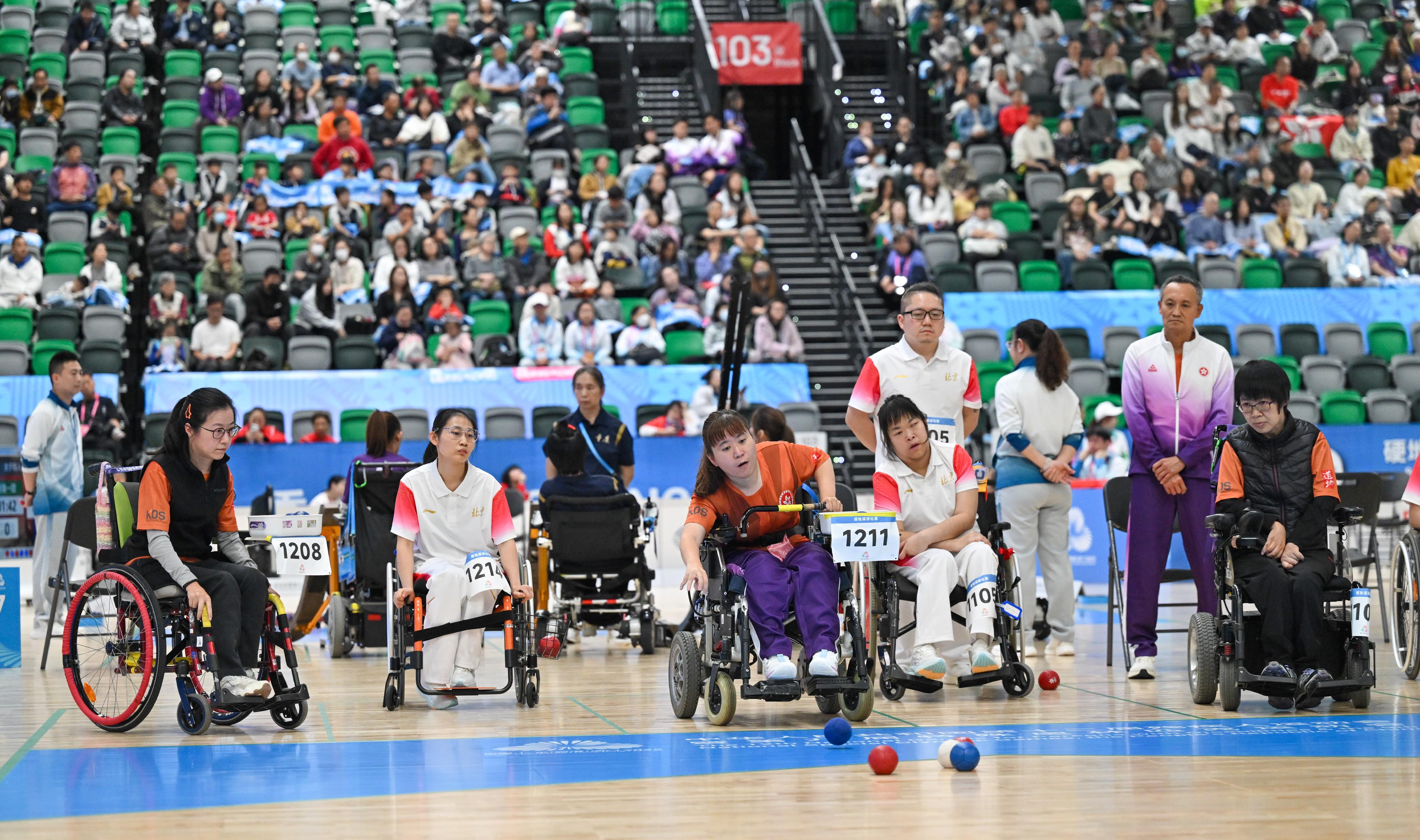 The double and group finals of the boccia competition of the 12th National Games for Persons with Disabilities and the 9th National Special Olympic Games was held at Kai Tak Arena, Kai Tak Sports Park today (December 14). Photo shows Hong Kong athletes competing at the Women's Group BC1/BC2 event.