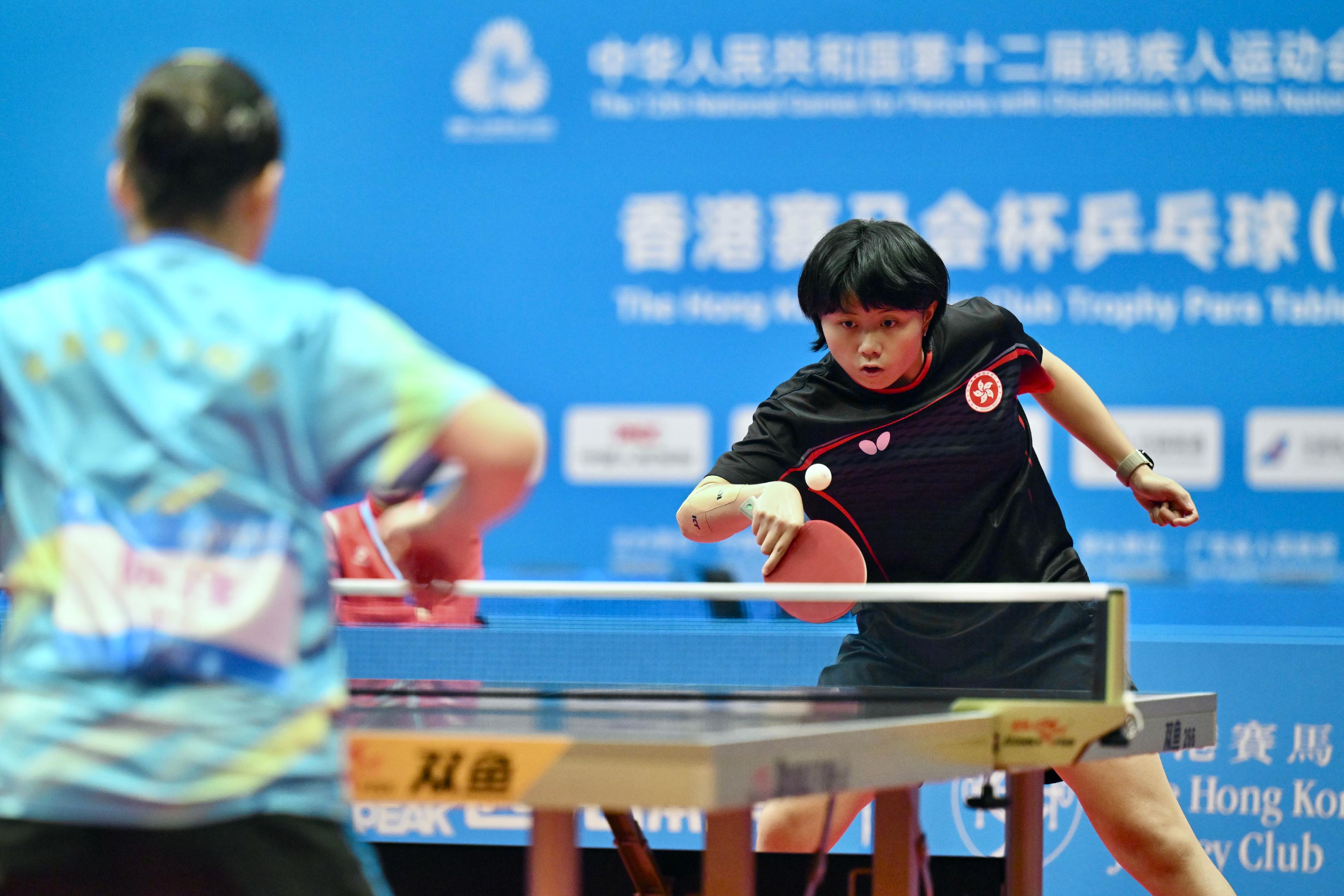 The Hong Kong Jockey Club Trophy para table tennis (TT11) competition of the 12th National Games for Persons with Disabilities and the 9th National Special Olympic Games was held today (December 14) at Tsuen Wan Sports Centre. Photo shows athletes competing in the women's singles event.