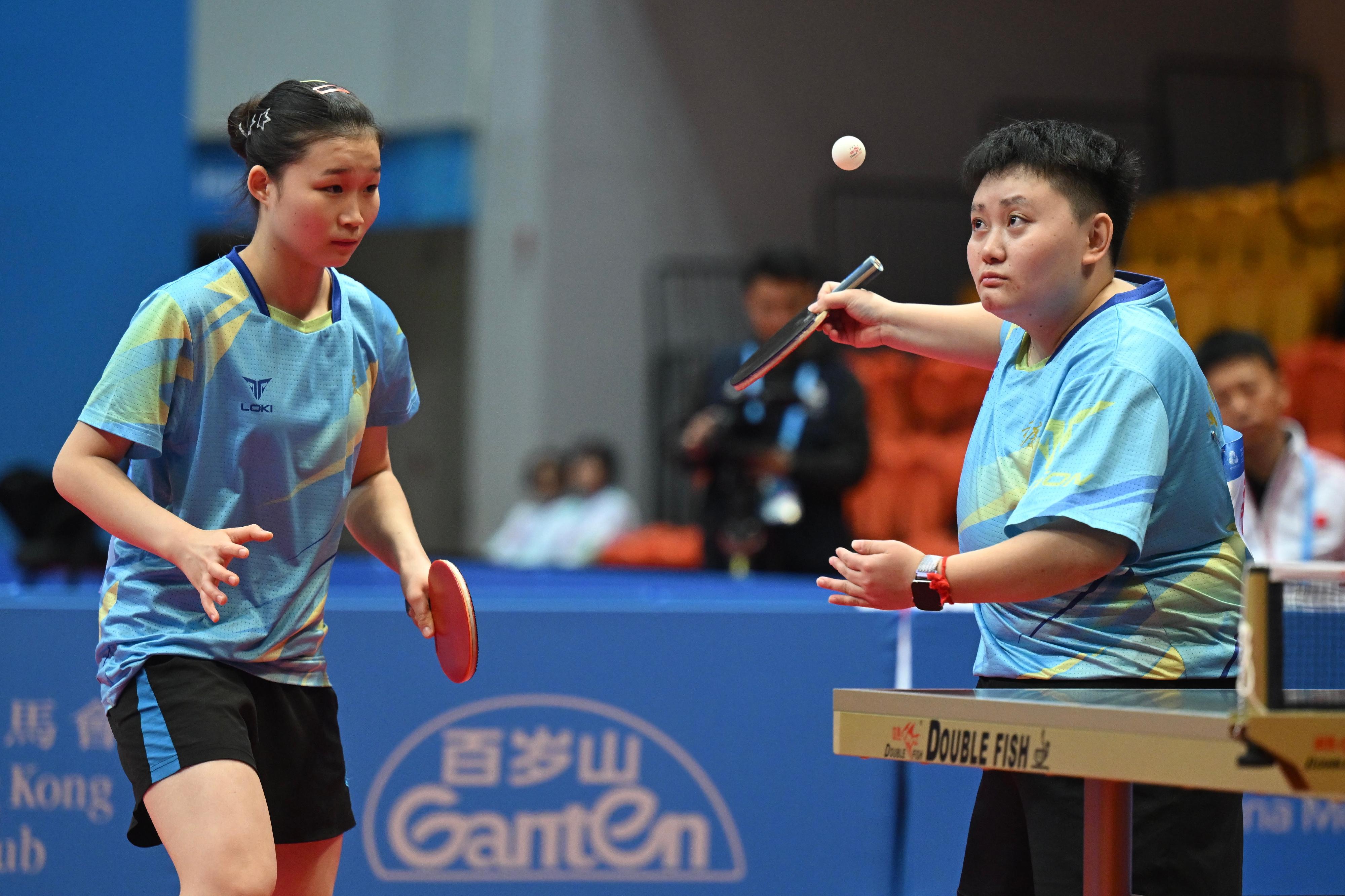 The Hong Kong Jockey Club Trophy para table tennis (TT11) competition of the 12th National Games for Persons with Disabilities and the 9th National Special Olympic Games was held today (December 14) at Tsuen Wan Sports Centre. Photo shows athletes competing in the women's doubles event.