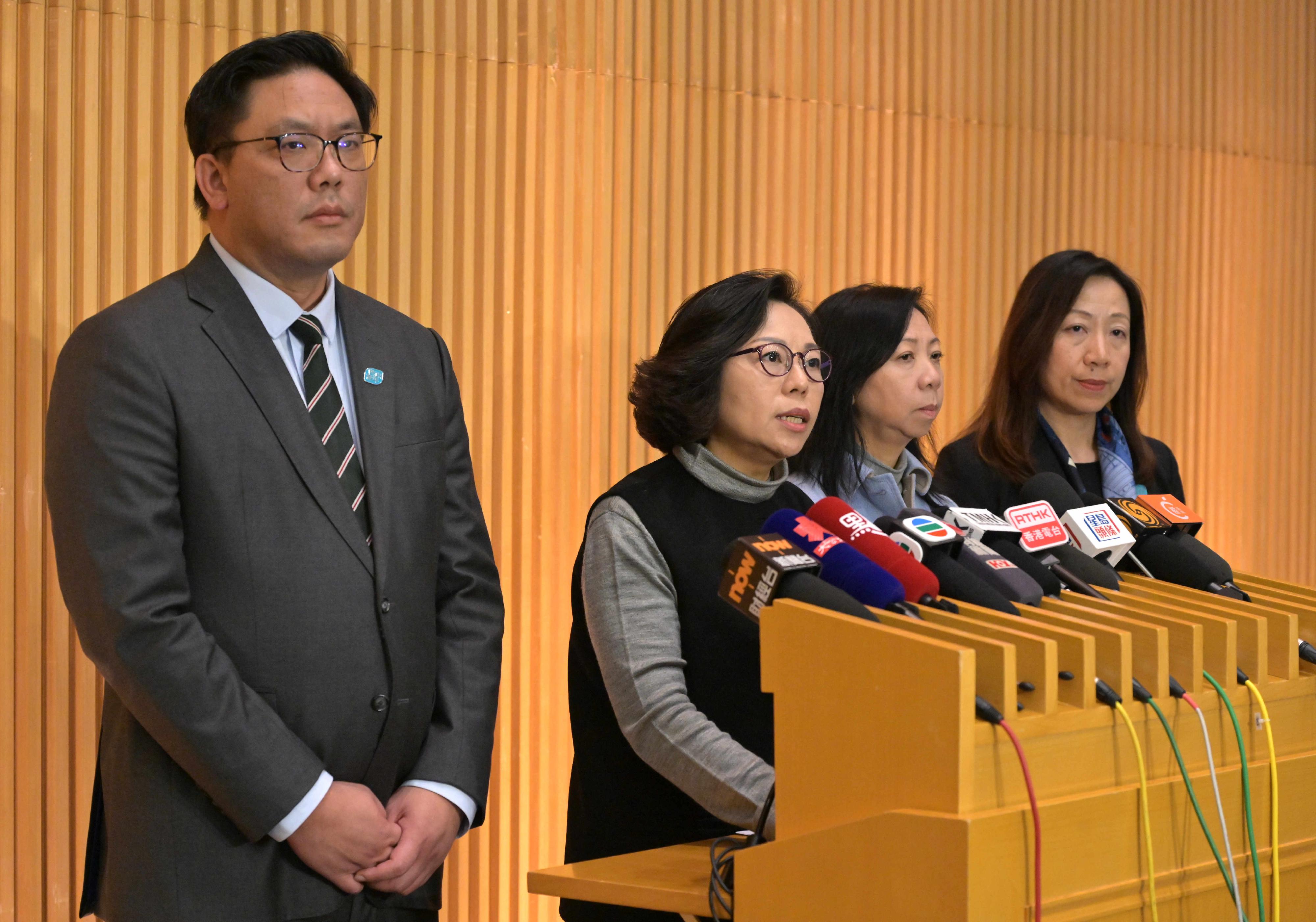 The Secretary for Home and Youth Affairs, Miss Alice Mak (second left); the Permanent Secretary for Home and Youth Affairs, Ms Shirley Lam (second right); the Under Secretary for Home and Youth Affairs, Mr Clarence Leung (first left); and the Director of Home Affairs, Ms Priscilla To (first right), meet the media today (December 19) on the management of Wang Fuk Court in Tai Po.