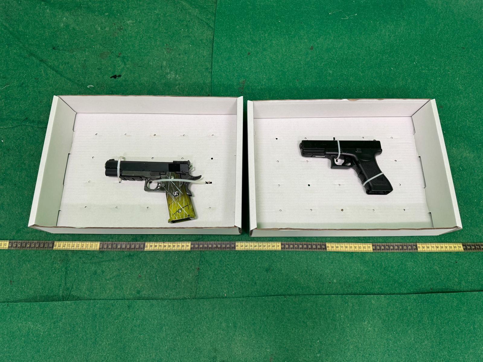 Hong Kong Customs detected a drug trafficking case involving an incoming passenger at Hong Kong International Airport today (December 22) and seized about 5 kilograms of suspected cocaine and arrested a man. Afterwards, Customs officers also seized three suspected gravity-operated steel batons and two suspected controlled air pistols in the man's residential premises. The total estimated market value of the seized items was about $4 million. Photo shows the suspected controlled air pistols seized in the case.