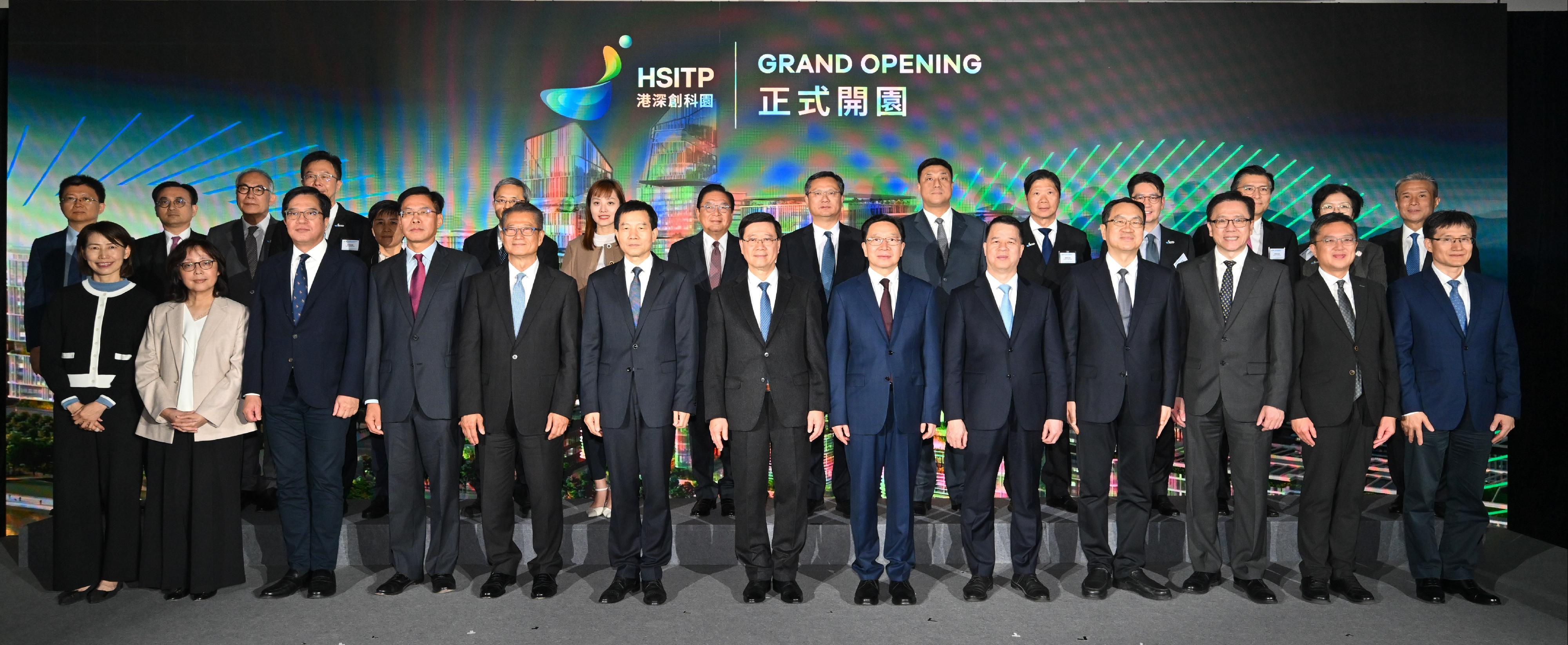 The Chief Executive, Mr John Lee, attended the Hong Kong-Shenzhen Innovation and Technology Park opening ceremony today (December 22). Photo shows (front row, from left) the Director of the Chief Executive's Office, Ms Carol Yip; the Secretary for Development, Ms Bernadette Linn; the Deputy Financial Secretary, Mr Michael Wong; Deputy Director of the Liaison Office of the Central People's Government in the Hong Kong Special Administrative Region Mr Qi Bin; the Financial Secretary, Mr Paul Chan; the Executive Deputy Director of the Hong Kong and Macao Affairs Office of the State Council, Mr Xu Qifang; Mr Lee; the Director of the Liaison Office of the Central People's Government in the Hong Kong Special Administrative Region, Mr Zhou Ji; Vice Mayor of Shenzhen Mr Luo Huanghao; the Director of Bureau III of the Hong Kong and Macao Affairs Office of the State Council, Mr Zou Jinsong; the Secretary for Innovation, Technology and Industry, Professor Sun Dong; the Permanent Secretary for Innovation, Technology and Industry and Chairman of the Hong Kong-Shenzhen Innovation and Technology Park Limited, Mr Kevin Choi; the Director-General of the Department of Educational, Scientific and Technological Affairs of the Liaison Office of the Central People's Government in the Hong Kong Special Administrative Region, Dr Wang Weiming, and other guests at the ceremony.
