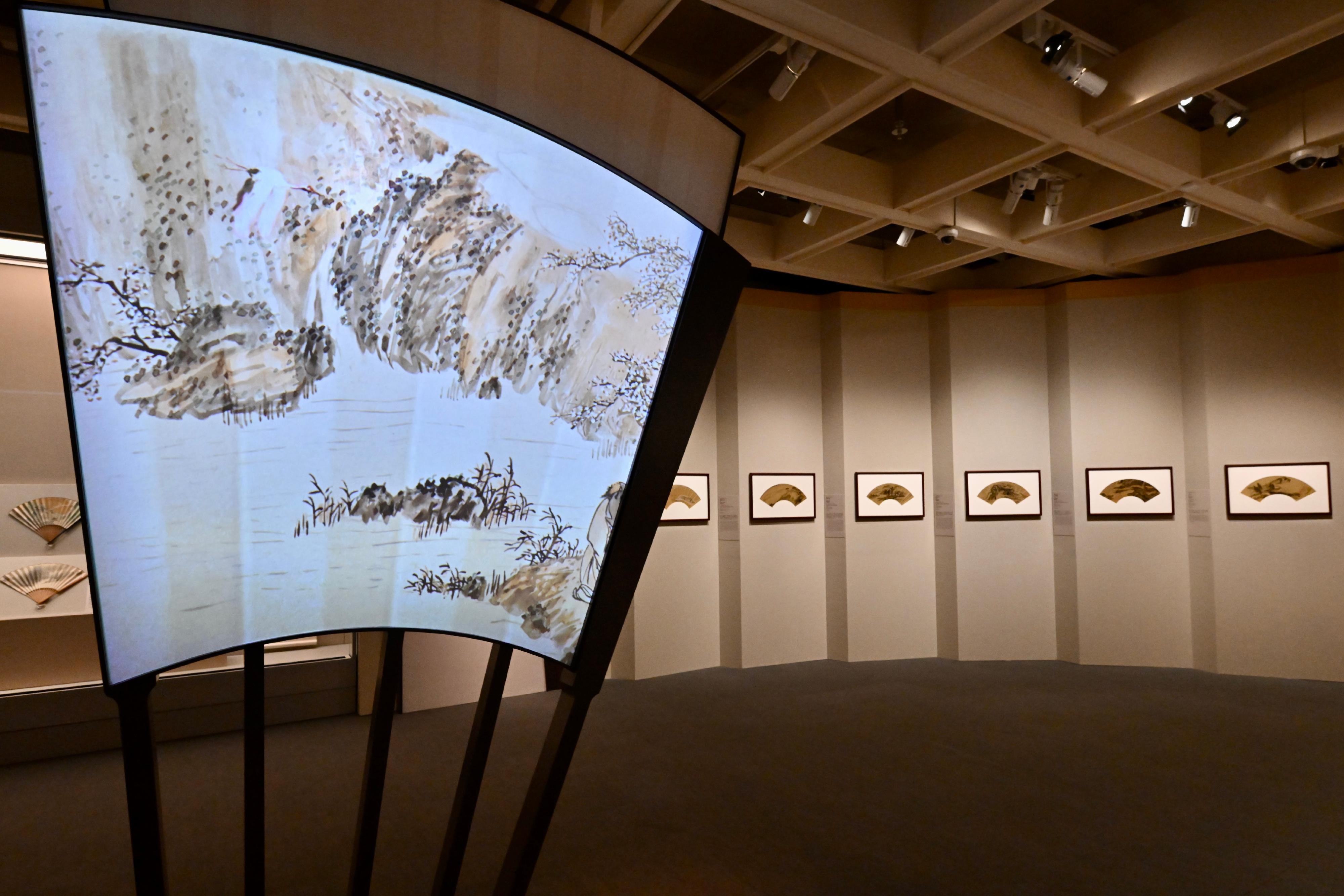 The Hong Kong Museum of Art today (December 23) unveils the&ldquo;Fantastic Breeze: Selected Fans from the Jingguanlou Collection&rdquo; exhibition. Photo shows a set of landscape paintings on gold-paper fan leaves by renowned 20th-century Chinese artists.
