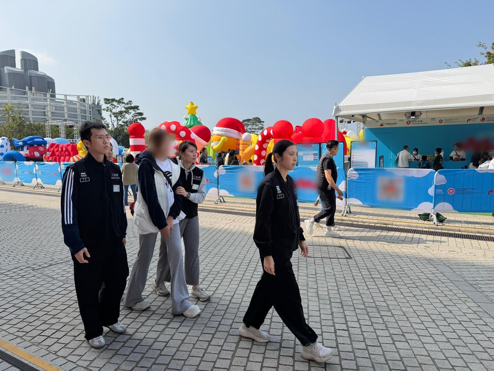 The Immigration Department mounted a series of territory-wide anti-illegal worker operations, including joint operations with the Hong Kong Police Force codenamed "Champion", from December 21 to yesterday (December 23). Photo shows suspected illegal workers arrested during an operation.