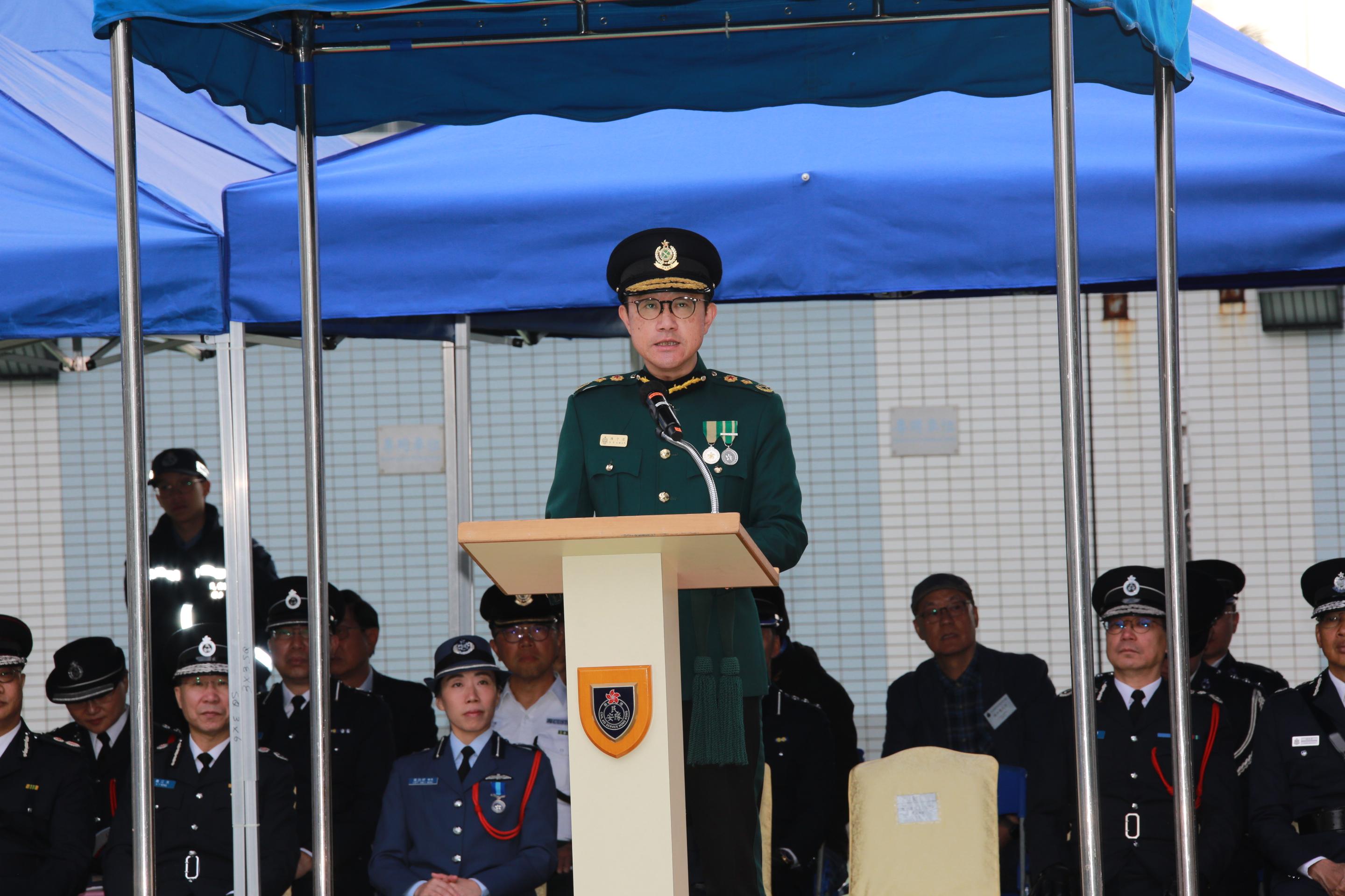 The Civil Aid Service held the Passing-out Parade for the 91st Recruits at its headquarters today (December 28). Photo shows the Commissioner of Customs and Excise, Mr Chan Tsz-tat, delivering a speech at the parade.