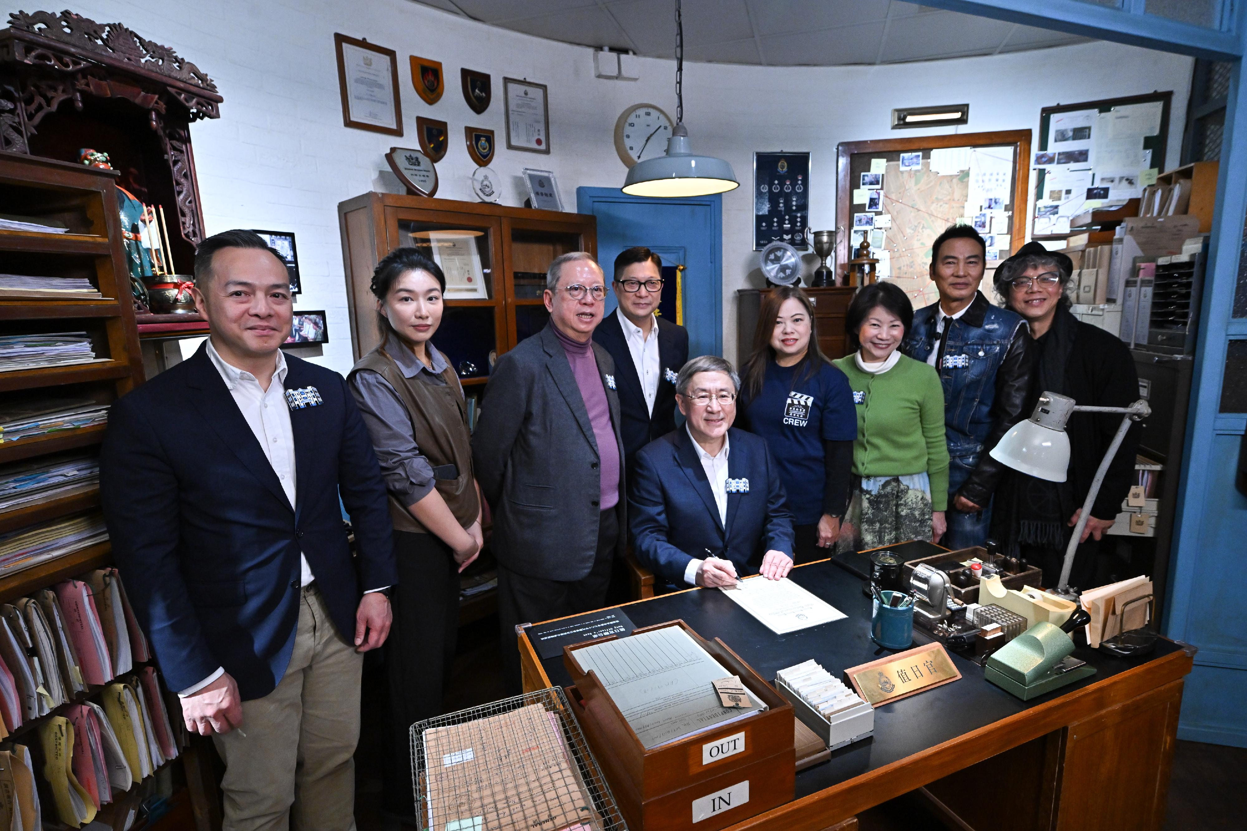 The opening ceremony of the "Yau Ma Tei Police Station: A Cinematic Journey" exhibition, presented by the Cultural and Creative Industries Development Agency under the Culture, Sports and Tourism Bureau, was held at the Old Yau Ma Tei Police Station today (January 1). Photo shows the officiating guests visiting the exhibition. 
