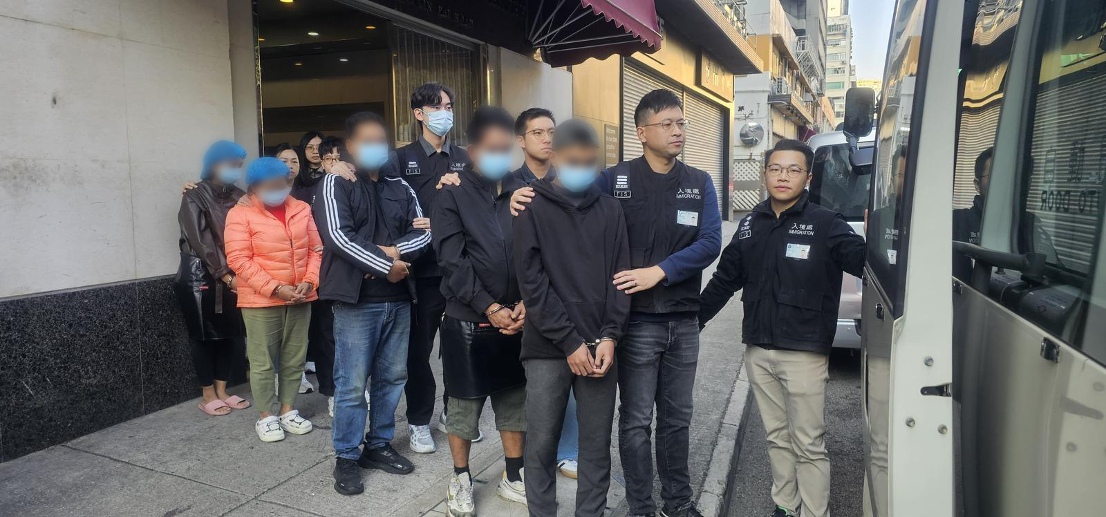 The Immigration Department conducted a series of territory-wide anti-illegal worker operations codenamed "Swordfish" for four consecutive days from January 3 to 6. Photo shows suspected illegal workers arrested during an operation.