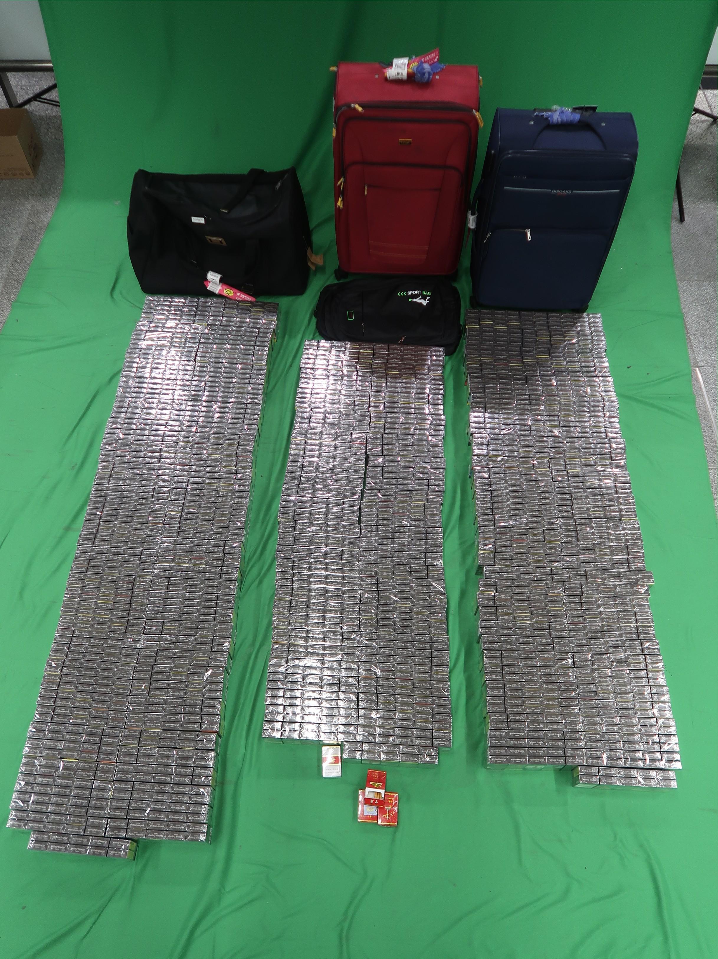 One incoming 42-year-old male passenger was sentenced to four months imprisonment by the West Kowloon Magistrates' Courts today (January 7) for dealing with duty-not-paid cigarettes and failing to declare them to Customs officers, in contravention of the Dutiable Commodities Ordinance. Photo shows the duty-not-paid cigarettes seized. 