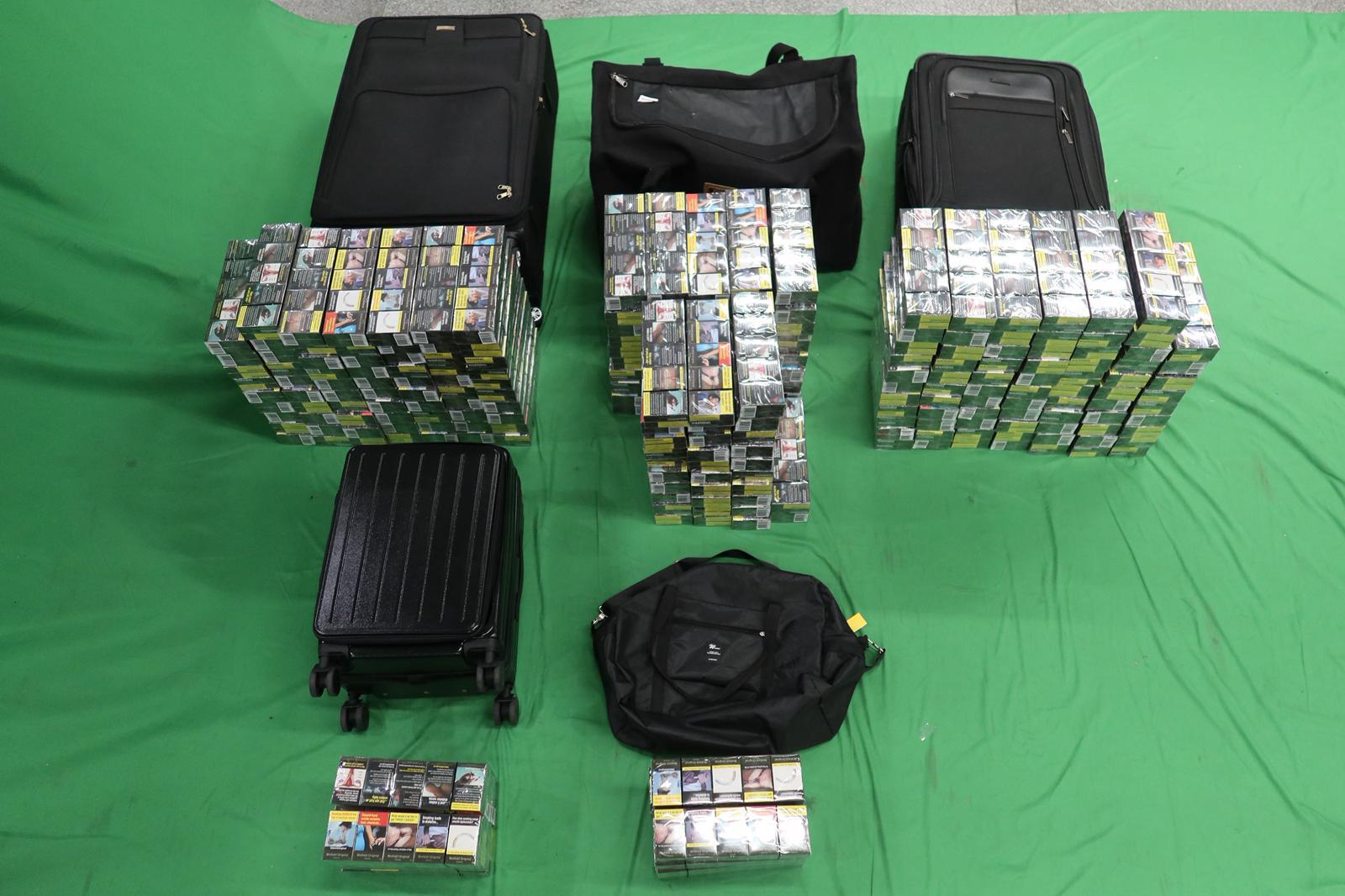 A 43-year-old incoming female passenger was sentenced to six months' imprisonment and fined $1,000 by the Kowloon City Magistrates' Courts today (January 10) for importing duty-not-paid cigarettes and failing to declare them to Customs officers, in contravention of the Dutiable Commodities Ordinance. Photo shows the duty-not-paid cigarettes seized.