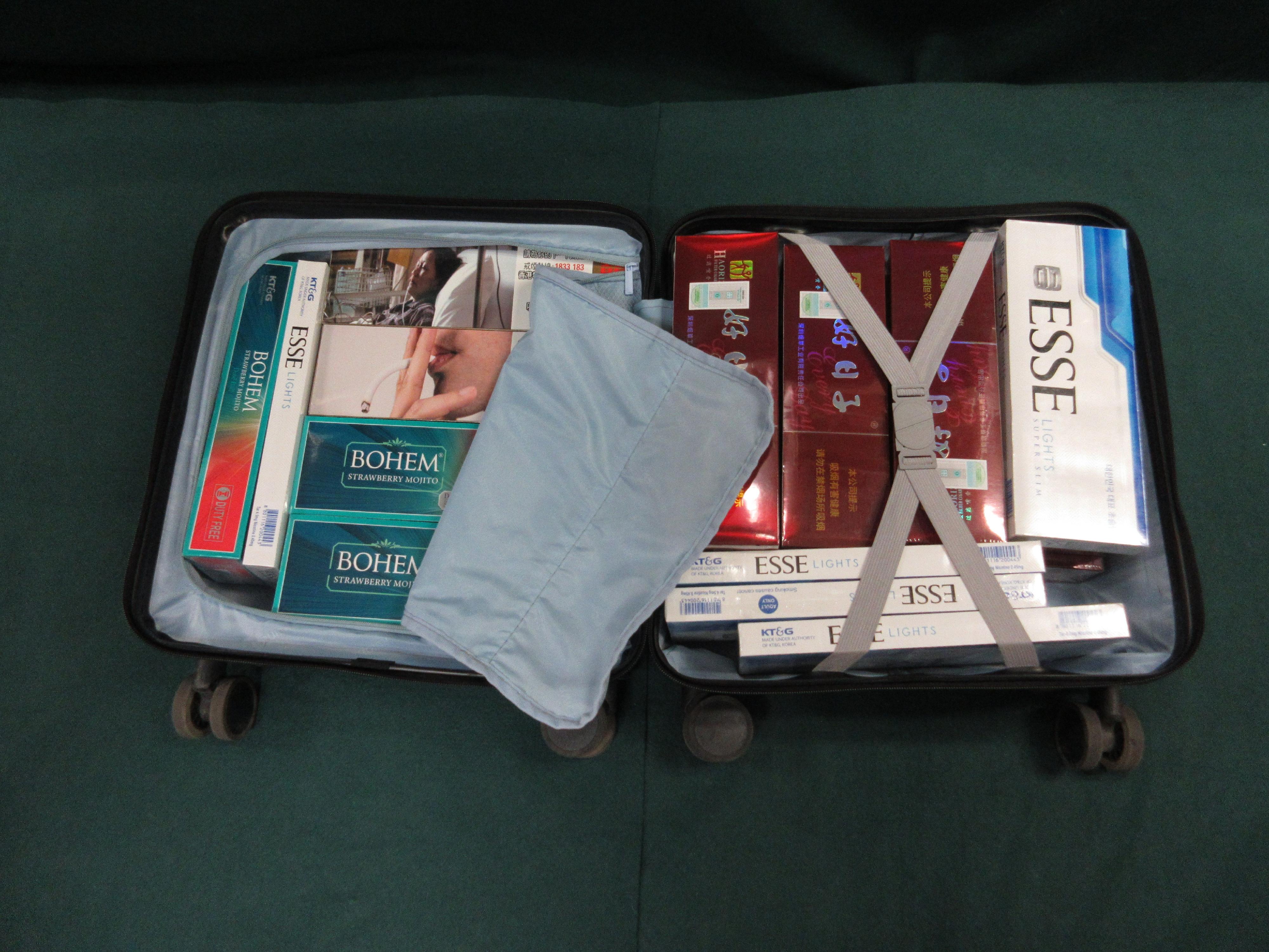 An incoming female passenger was sentenced to three months' imprisonment and fined $1,500 at the Fanling Magistrates' Courts today (January 15) for possessing duty-not-paid cigarettes and failing to declare them to Customs officers, in contravention of the Dutiable Commodities Ordinance. Photo shows the duty-not-paid cigarettes seized.