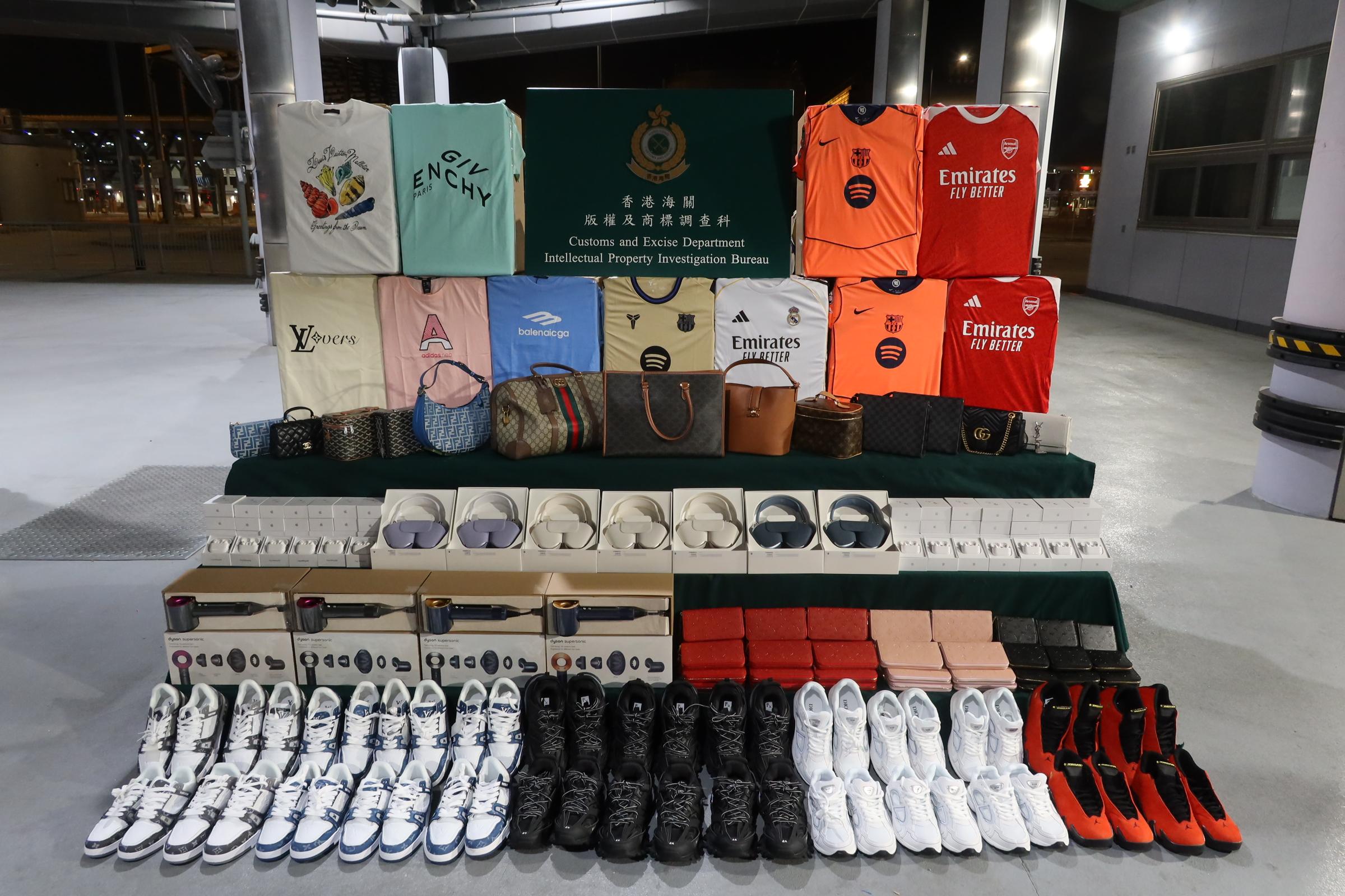Hong Kong Customs conducted an enforcement operation with the Mainland and Macao Customs from December 31, 2025 to January 12, 2026, during which inspections of goods across the three places and destined for countries in the Americas, Europe, Middle East and Southeast Asia were stepped up, with a view to combating cross-boundary and transshipment counterfeiting activities. During the operation, Hong Kong Customs detected 14 cases and seized about 19 000 suspected counterfeit goods, including handbags, footwear and electric products, with a total estimated market value of about $14 million. Photo shows some of the seizure by Hong Kong Customs.