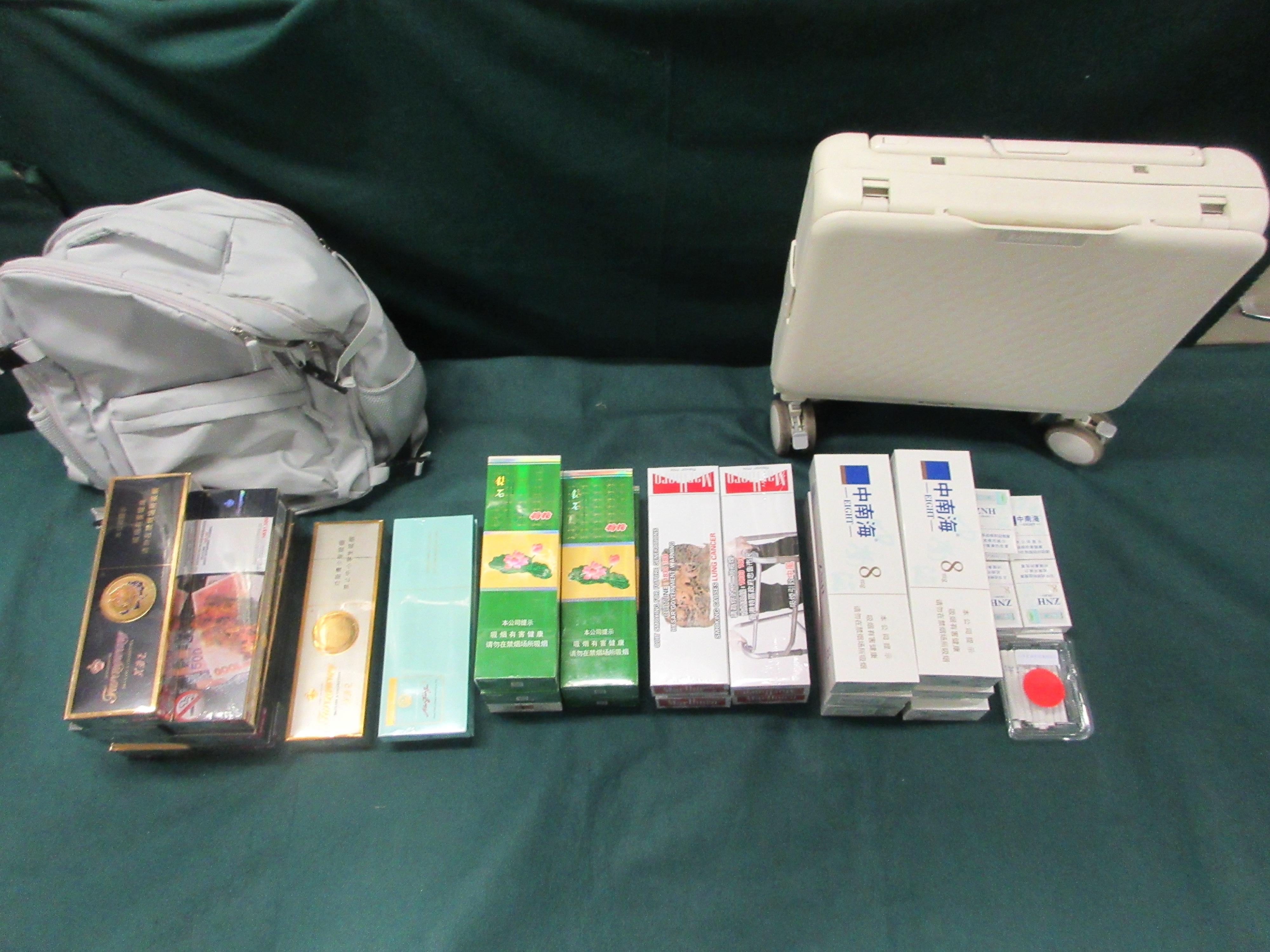 Two incoming passengers were sentenced to two months' and 10 weeks' imprisonment respectively by the Fanling Magistrates' Courts today (January 16) for possessing duty-not-paid cigarettes and failing to declare them to Customs officers, in contravention of the Dutiable Commodities Ordinance. Photo shows some of the duty-not-paid cigarettes seized.