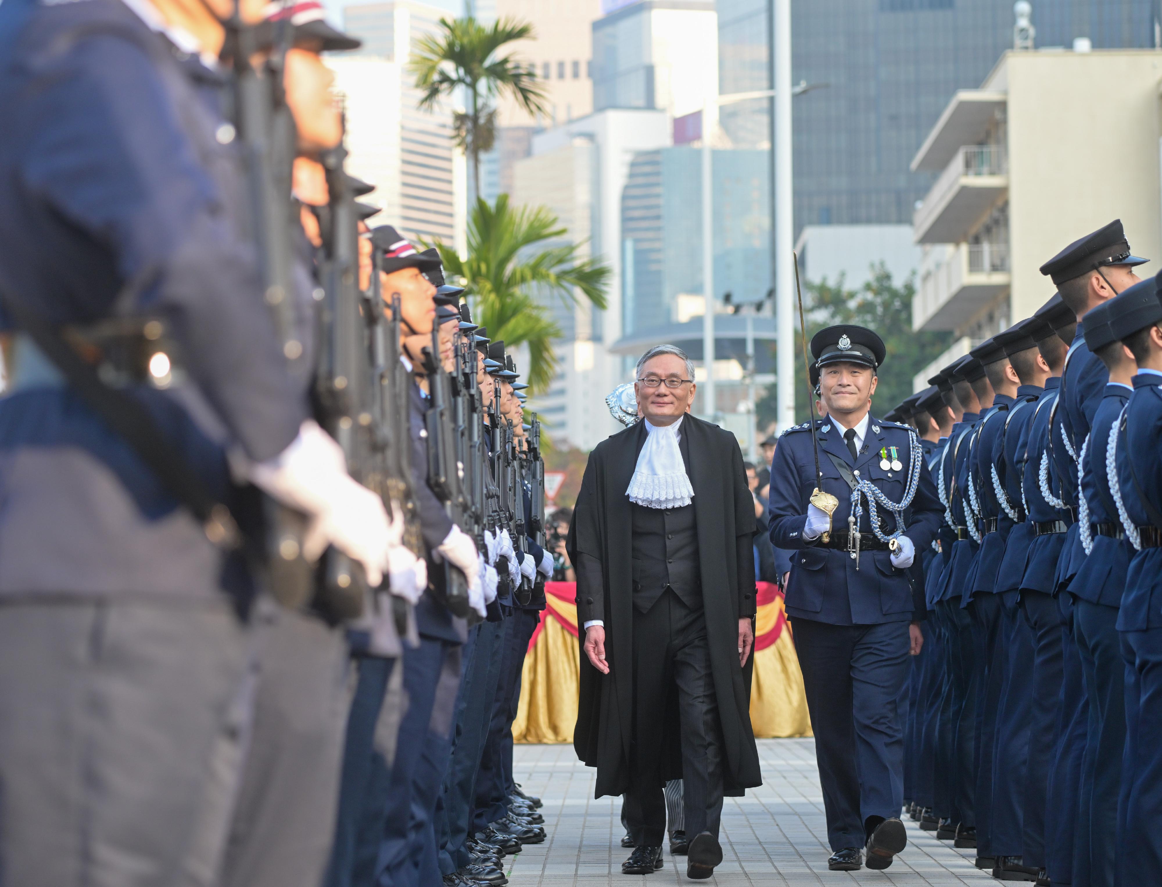 Chief Justice Andrew Cheung, Chief Justice of the Court of Final Appeal, inspects a Ceremonial Guard mounted by the Hong Kong Police Force at Edinburgh Place during the Ceremonial Opening of the Legal Year 2026 today (January 19).