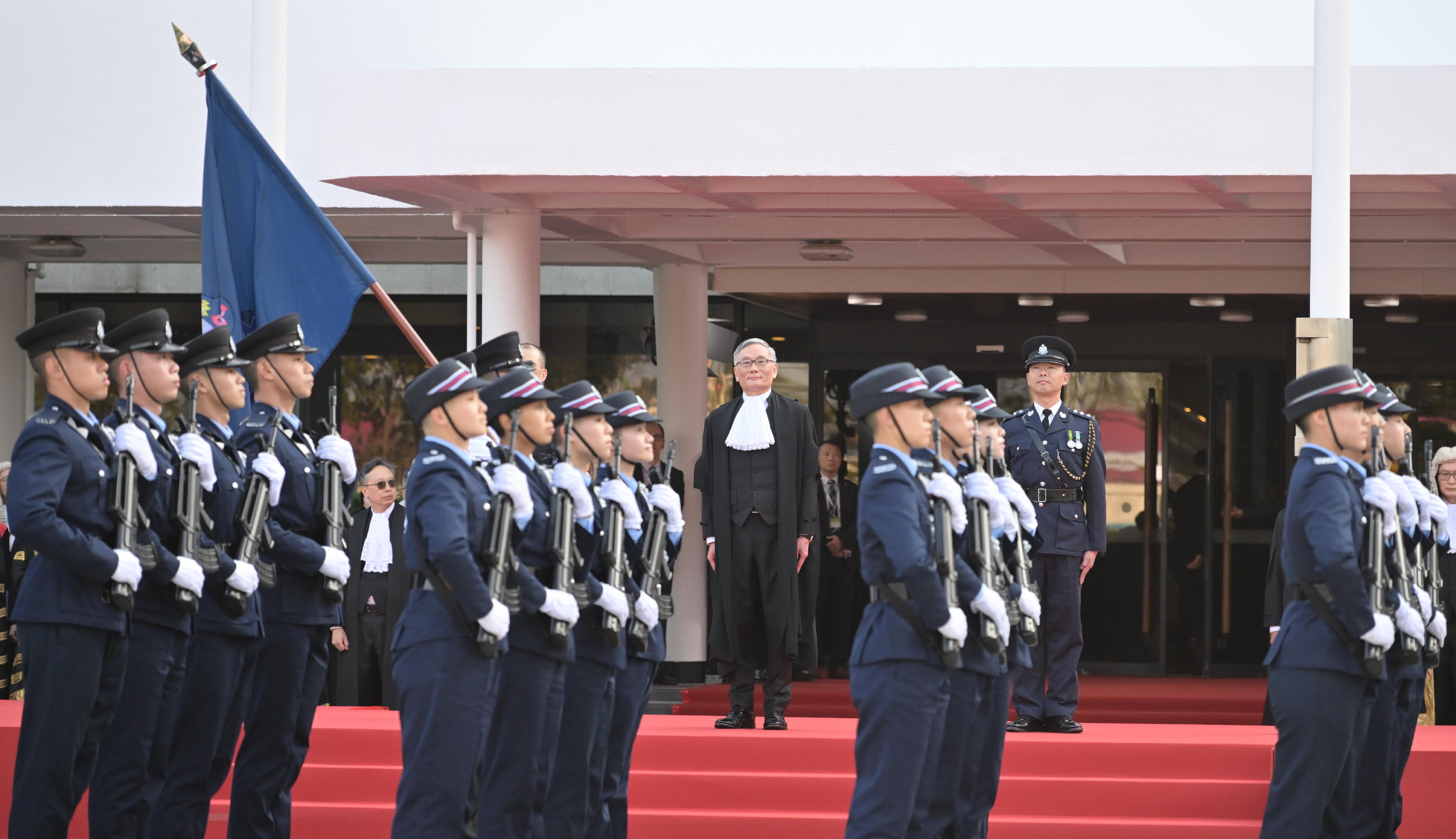 Chief Justice Andrew Cheung, Chief Justice of the Court of Final Appeal, inspects a Ceremonial Guard mounted by the Hong Kong Police Force at Edinburgh Place during the Ceremonial Opening of the Legal Year 2026 today (January 19).