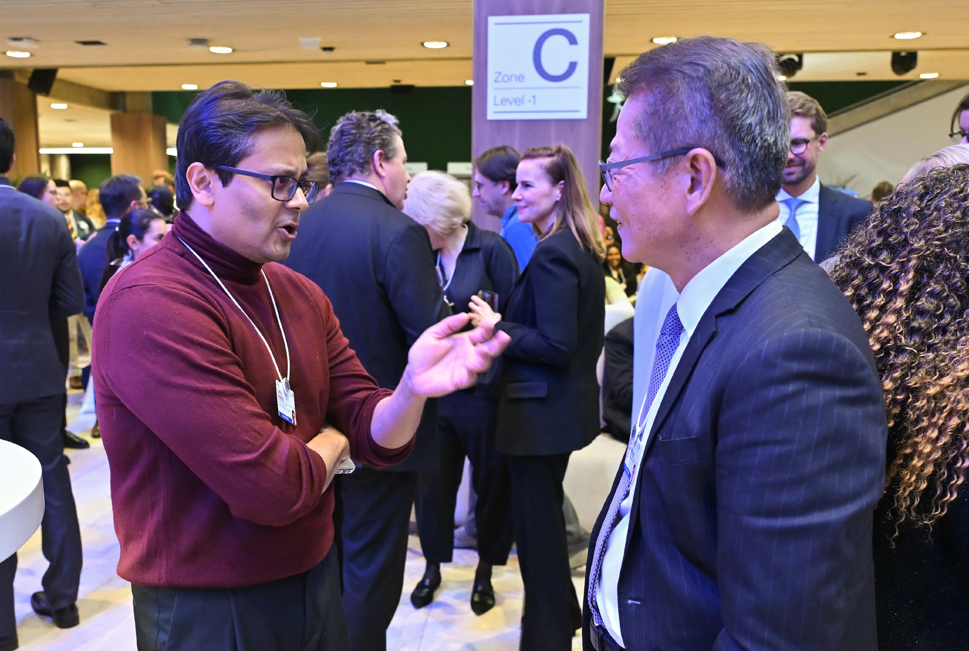 The Financial Secretary, Mr Paul Chan, arrived in Davos, Switzerland yesterday (January 19, Davos time) to attend the World Economic Forum (WEF) Annual Meeting 2026. Photo shows Mr Chan (right) attending the welcoming reception of WEF Annual Meeting 2026.