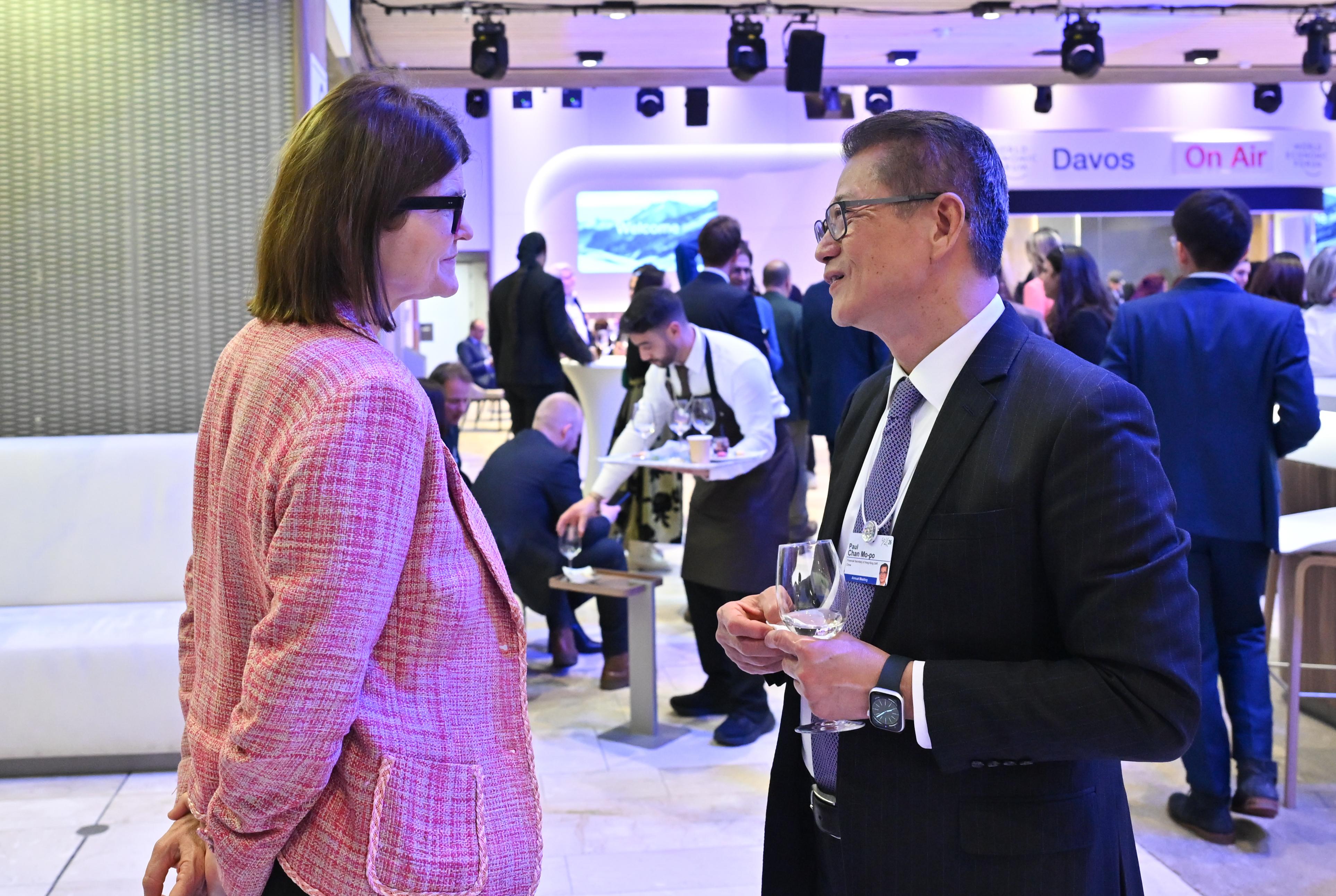 The Financial Secretary, Mr Paul Chan, arrived in Davos, Switzerland yesterday (January 19, Davos time) to attend the World Economic Forum (WEF) Annual Meeting 2026. Photo shows Mr Chan (right) attending the welcoming reception of WEF Annual Meeting 2026.