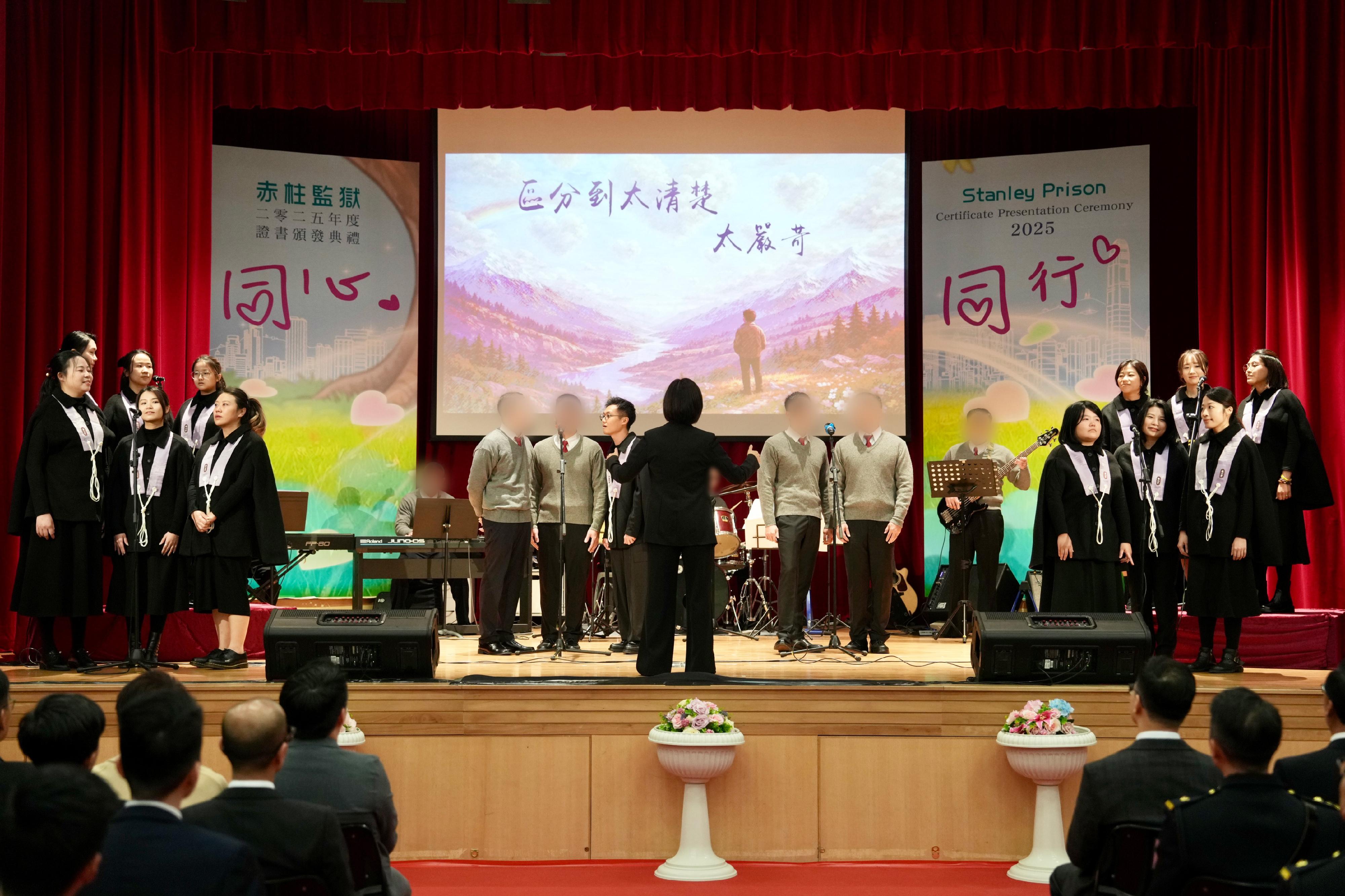 Persons in custody at Stanley Prison of the Correctional Services Department were presented with certificates at a ceremony today (January 21) in recognition of their continuous efforts in pursuing further studies. Photo shows a music performance by a band composed of persons in custody and the Tsz Shan Youth Choir.