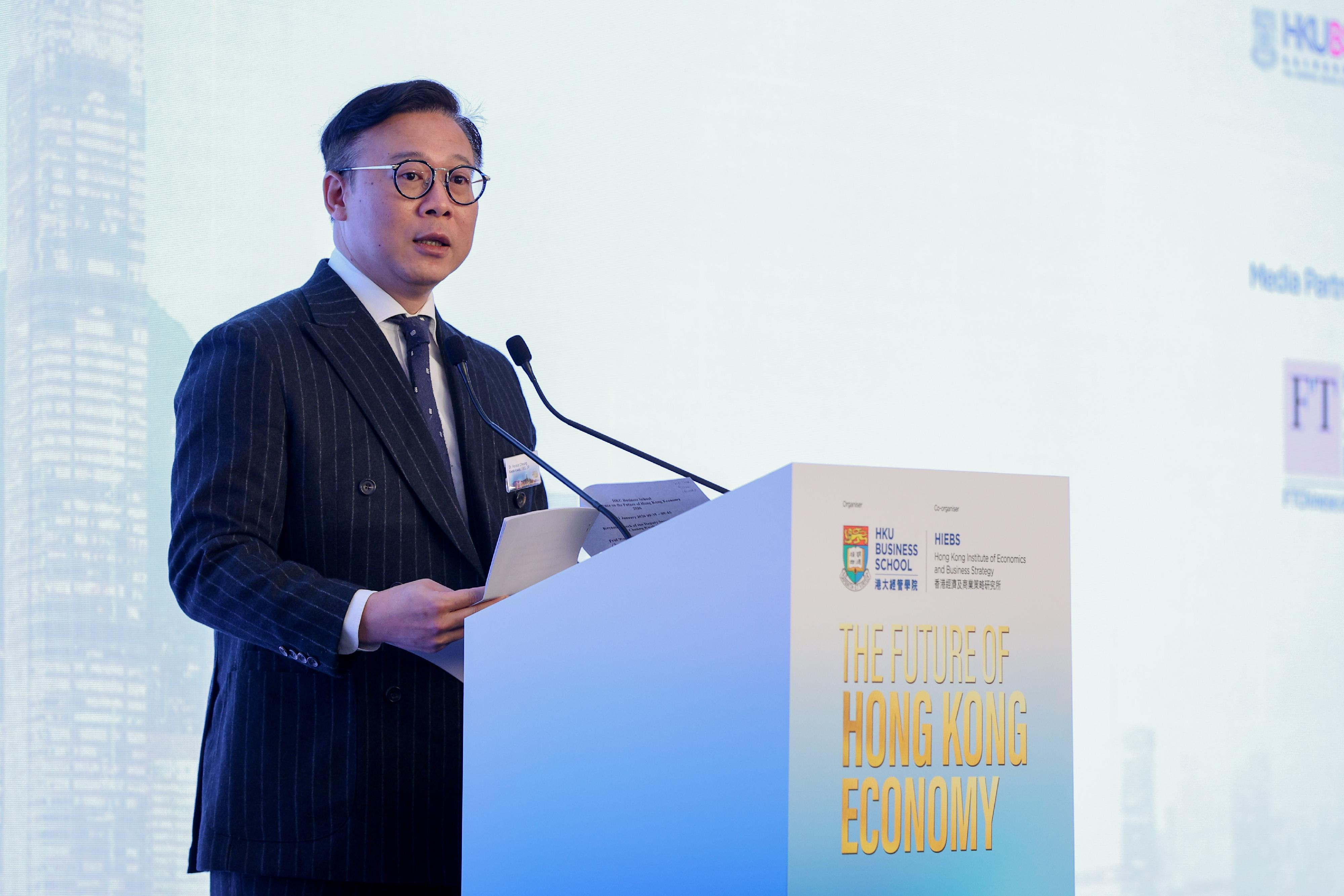 The Deputy Secretary for Justice, Dr Cheung Kwok-kwan, speaks at the conference on The Future of Hong Kong Economy today (January 21).
