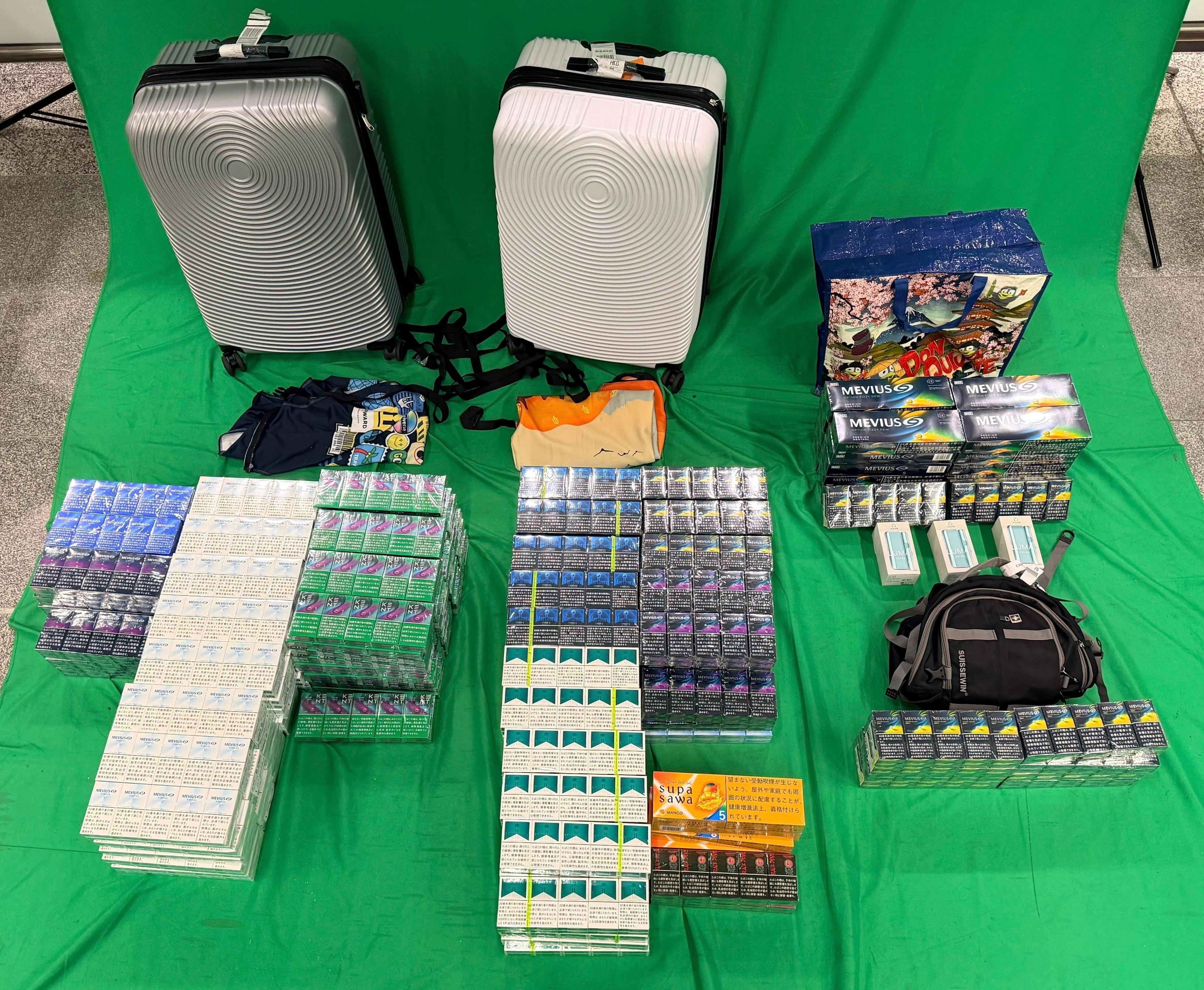 An incoming male passenger was sentenced to five months' imprisonment by the West Kowloon Magistrates' Courts today (January 21) for importing duty-not-paid cigarettes and failing to declare them to Customs officers, in contravention of the Dutiable Commodities Ordinance. Photo shows the duty-not-paid cigarettes seized. 