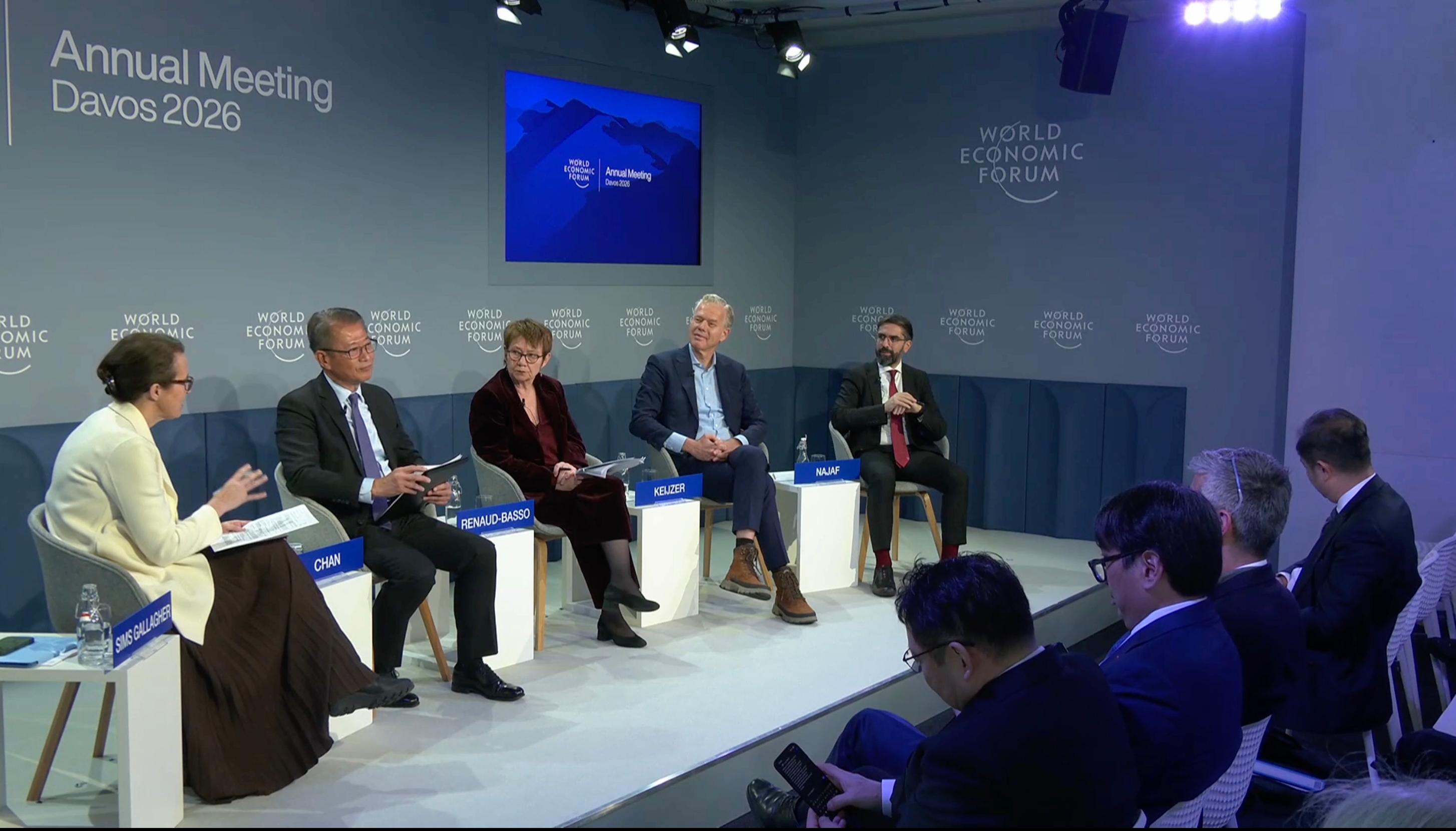 The Financial Secretary, Mr Paul Chan, continued his programme at the World Economic Forum Annual Meeting in Davos, Switzerland, yesterday (January 22, Davos time). Photo shows Mr Chan (second left) serving as a speaker at a thematic meeting with the theme of "How to Finance Decarbonization?".
