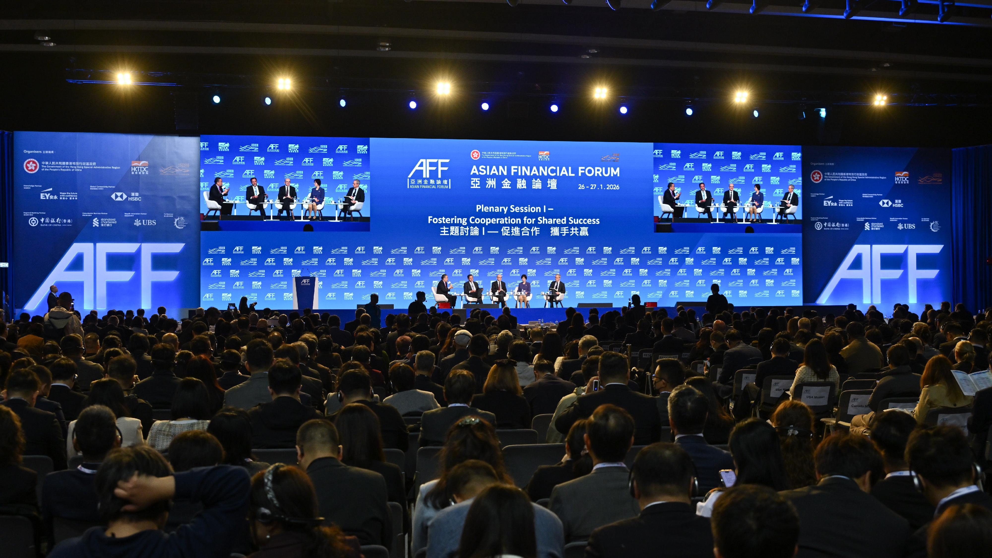 The Secretary for Financial Services and the Treasury, Mr Christopher Hui (first left), chairs the plenary session themed "Fostering Co-operation for Shared Success" at the Asian Financial Forum this morning (January 26), to discuss with Deputy Prime Minister and Minister for Finance of Slovenia, Mr Klemen Boštjančič (second left); the Minister of Treasury and Finance of Türkiye, Mr Mehmet Şimşek (third left); the President of the Asian Infrastructure Investment Bank, Ms Zou Jiayi (second right); and the Vice-President (East and Southeast Asia, and the Pacific) of Asian Development Bank, Mr Scott Morris (first right), how to strengthen communication and dialogue among economies and pursue shared development amid the evolving global political and economic landscape.