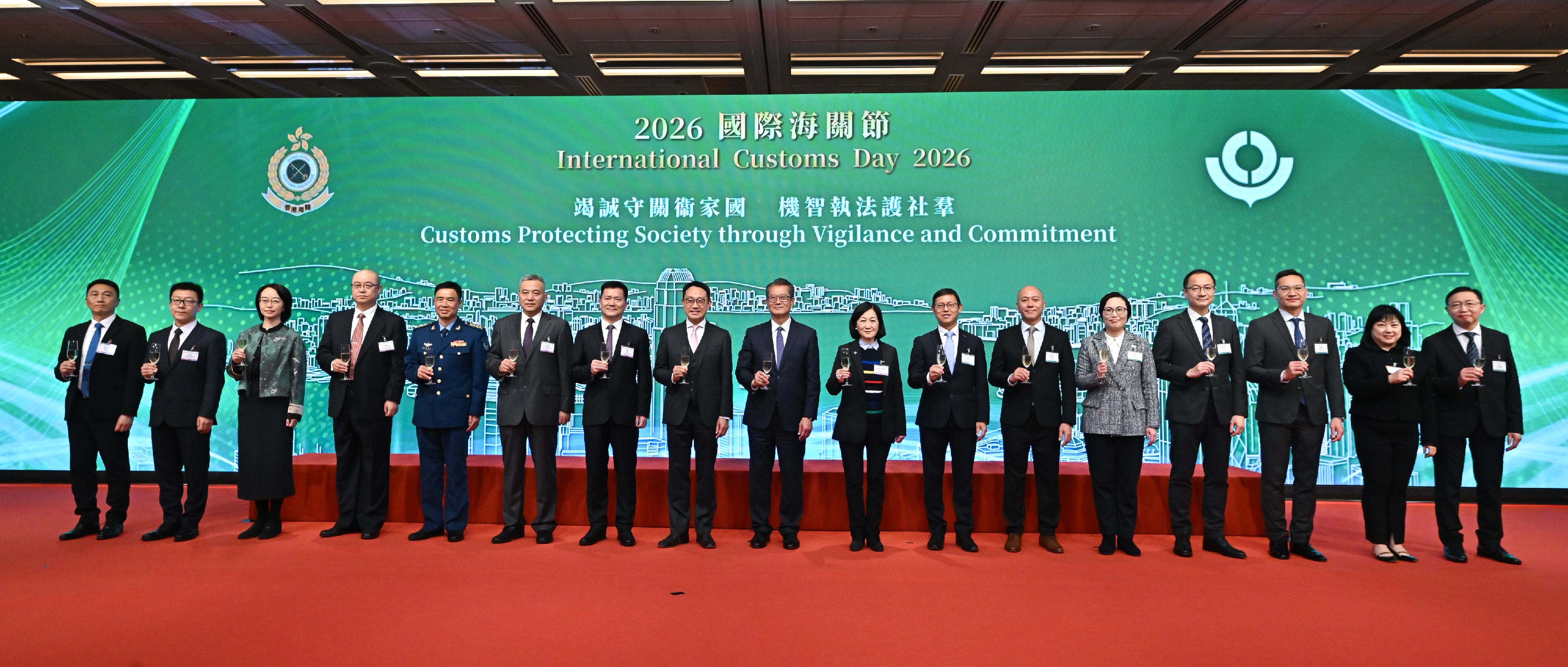The Financial Secretary, Mr Paul Chan, attended the International Customs Day Reception 2026 today (January 27). Photo shows Mr Chan (centre), the Commissioner of Customs and Excise, Mr Chan Tsz-tat (eighth left), and other guests at the reception.