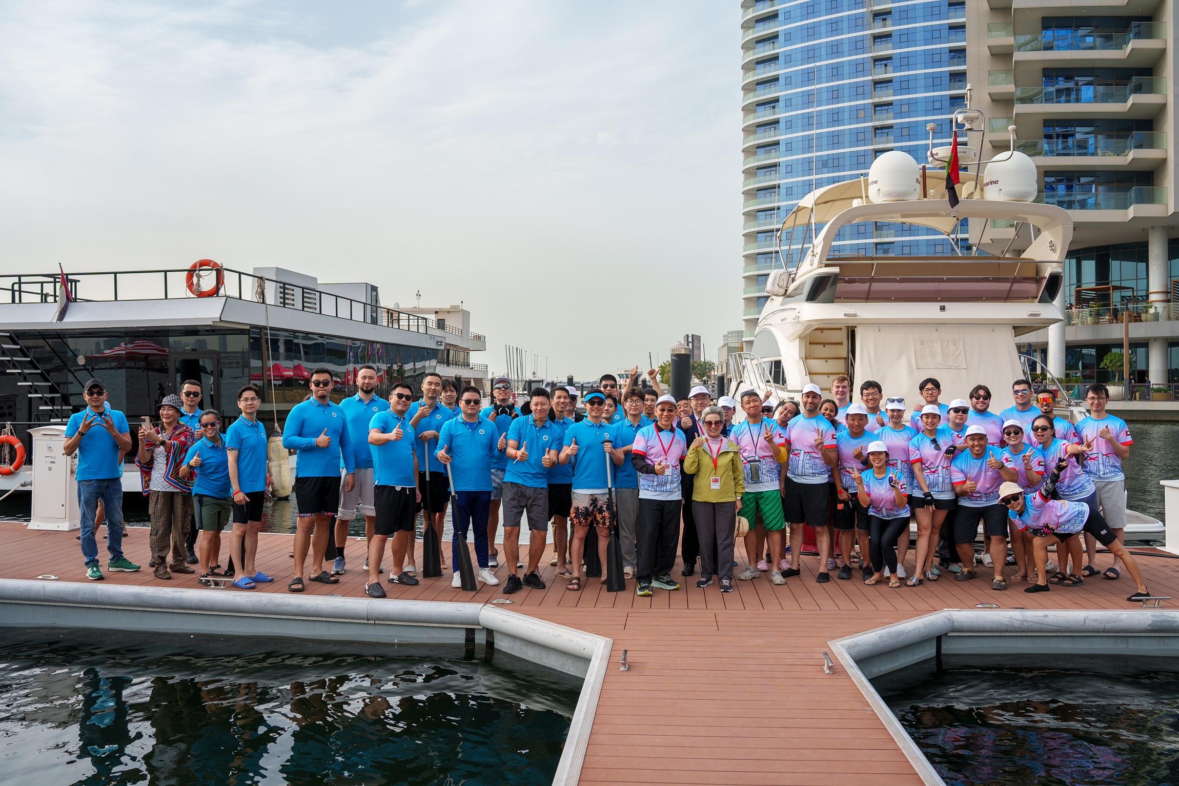 The Hong Kong Economic and Trade Office in Dubai (Dubai ETO) presented the Hong Kong Dragon Boat Challenge 2026 in Dubai, the United Arab Emirates, on January 24 and 25 (Dubai time). Photos shows the Director-General of the Dubai ETO, Mr Simon Chan (front row, thirteenth right), and the Consul-General of the People's Republic of China in Dubai, Ms Ou Boqian (front row, twelve right) encouraging paddlers of joint teams formed by the Dubai ETO and the Consulate General of the People's Republic of China in Dubai.