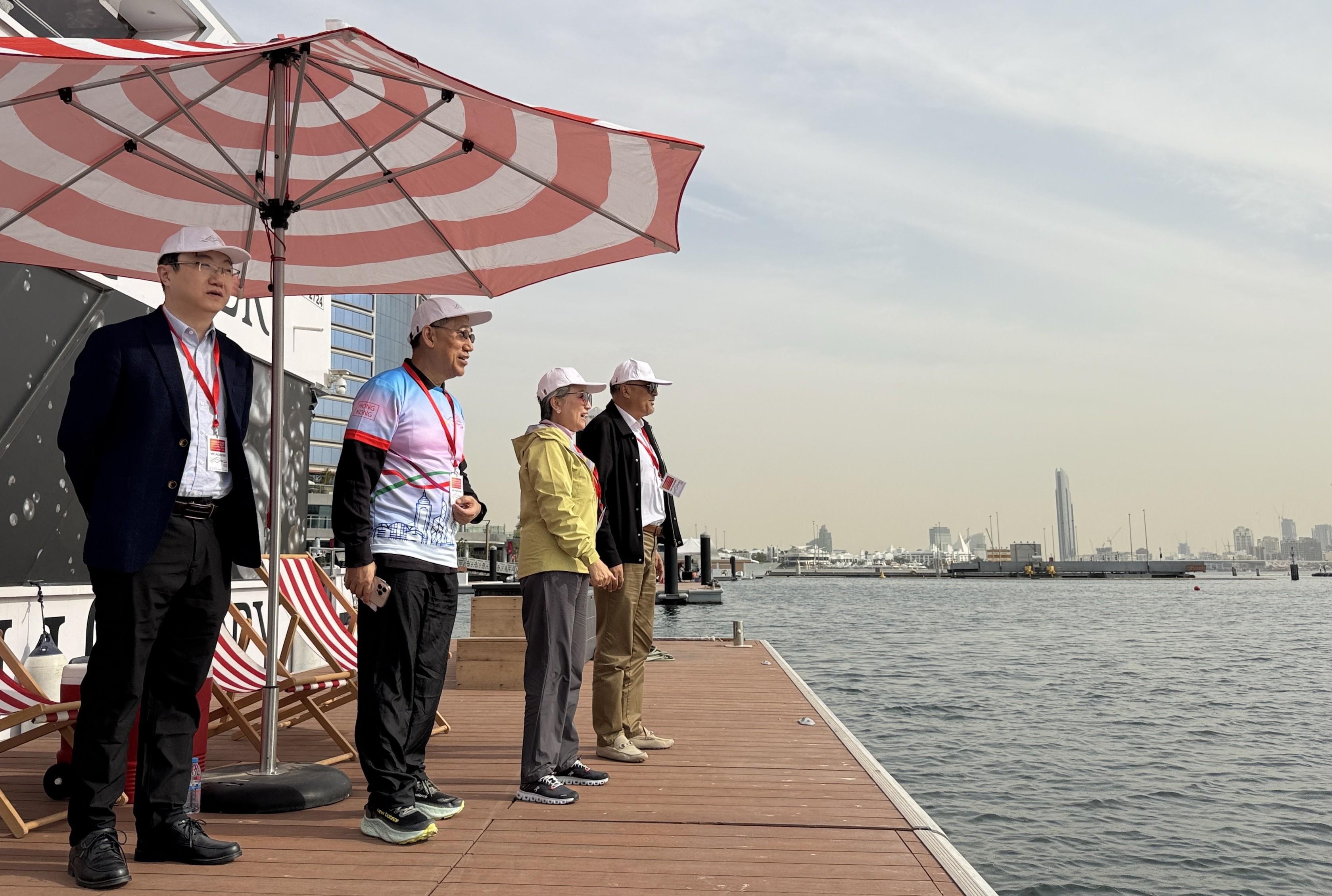 The Hong Kong Economic and Trade Office in Dubai (Dubai ETO) presented the Hong Kong Dragon Boat Challenge 2026 in Dubai, the United Arab Emirates, on January 24 and 25 (Dubai time). Photo shows the Director-General of Dubai ETO, Mr Simon Chan (second left), the Consul-General of the People's Republic of China in Dubai, Ms Ou Boqian (second right), and other guests watching the races.