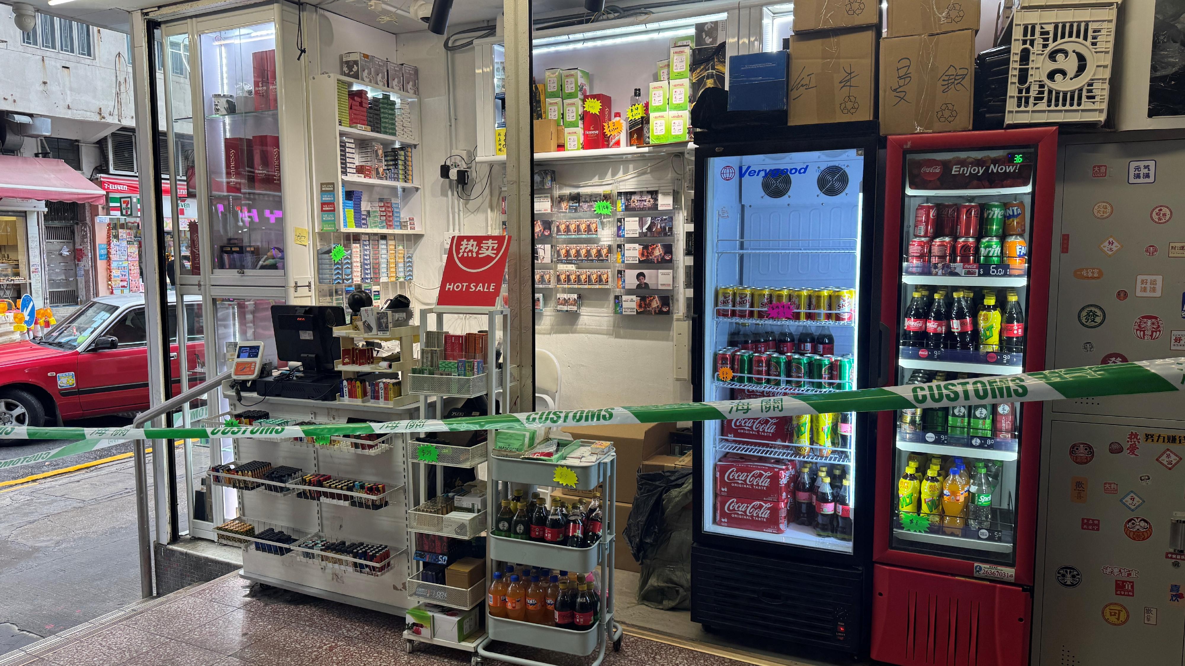 Hong Kong Customs mounted an anti-illicit cigarette enforcement operation for two consecutive days (January 29 and 30) and raided three suspected illicit cigarette sales outlets, which were three stores located in Sheung Shui, Kwai Chung and Chai Wan, seizing a total of about 13 000 suspected illicit cigarettes with an estimated market value of about $58,000 and a duty potential of about $43,000. Three persons were arrested. Photo shows the suspected illicit cigarette sales outlet in Kwai Chung.