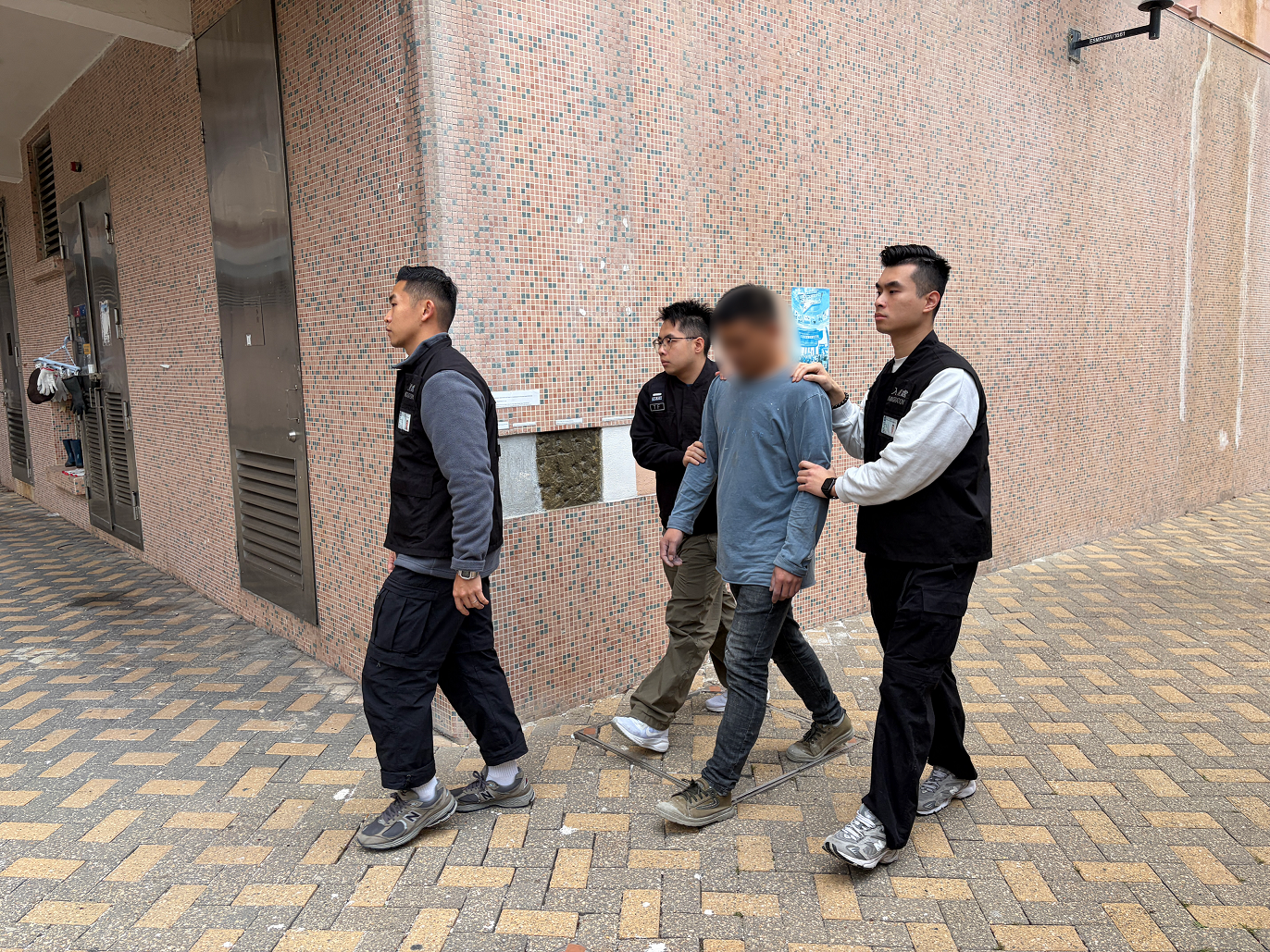 The Immigration Department mounted a series of territory-wide anti-illegal worker operations codenamed "Twilight" and joint operations with the Hong Kong Police Force codenamed "Champion" from January 22 to yesterday (January 29). Photo shows a suspected illegal worker arrested during an operation.