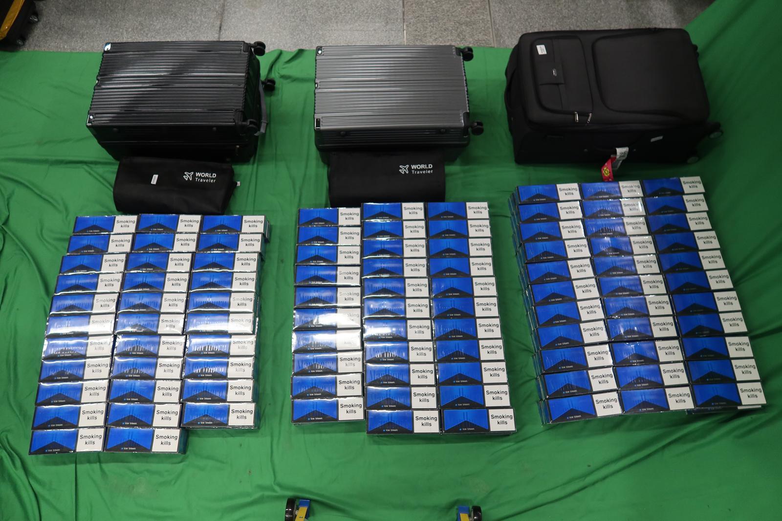 An incoming male passenger was sentenced to 5 months&rsquo; imprisonment and fined $1,500 by the West Kowloon Magistrates' Courts today (January 31) for importing duty-not-paid cigarettes and failing to declare them to Customs Officers, in contravention of the Dutiable Commodities Ordinance. Photo shows the duty-not-paid cigarettes seized.