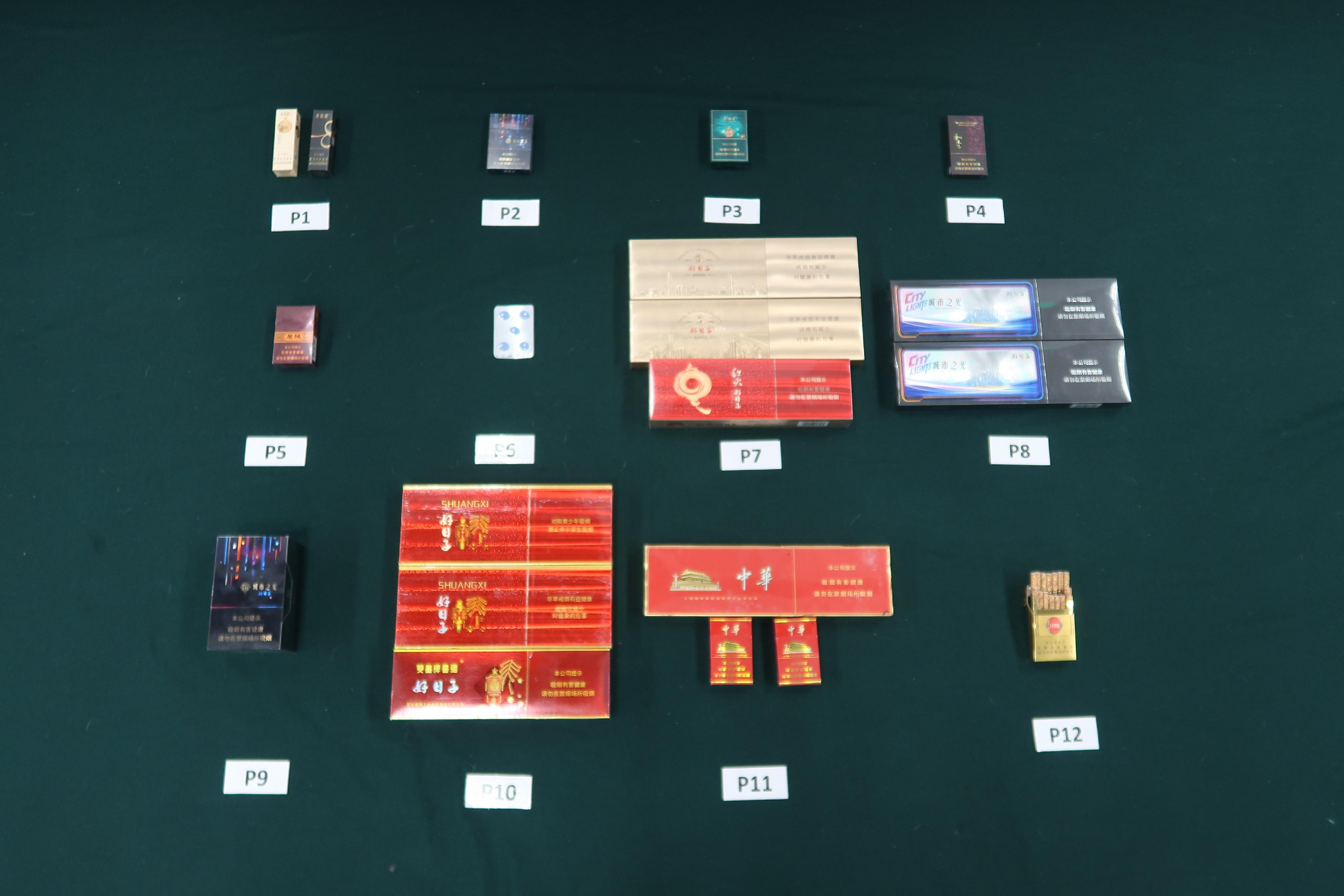 An incoming male passenger was sentenced to two months' imprisonment and fined $2,000 by the Tuen Mun Magistrates' Courts today (February 6) for possessing duty-not-paid cigarettes and failing to declare them to Customs officers, as well as for importing prohibited articles not under and in accordance with the import licence, in contravention of the Dutiable Commodities Ordinance and the Import and Export Ordinance. Photo shows the duty-not-paid cigarettes and pharmaceutical products seized from the 42-year-old male passenger. 