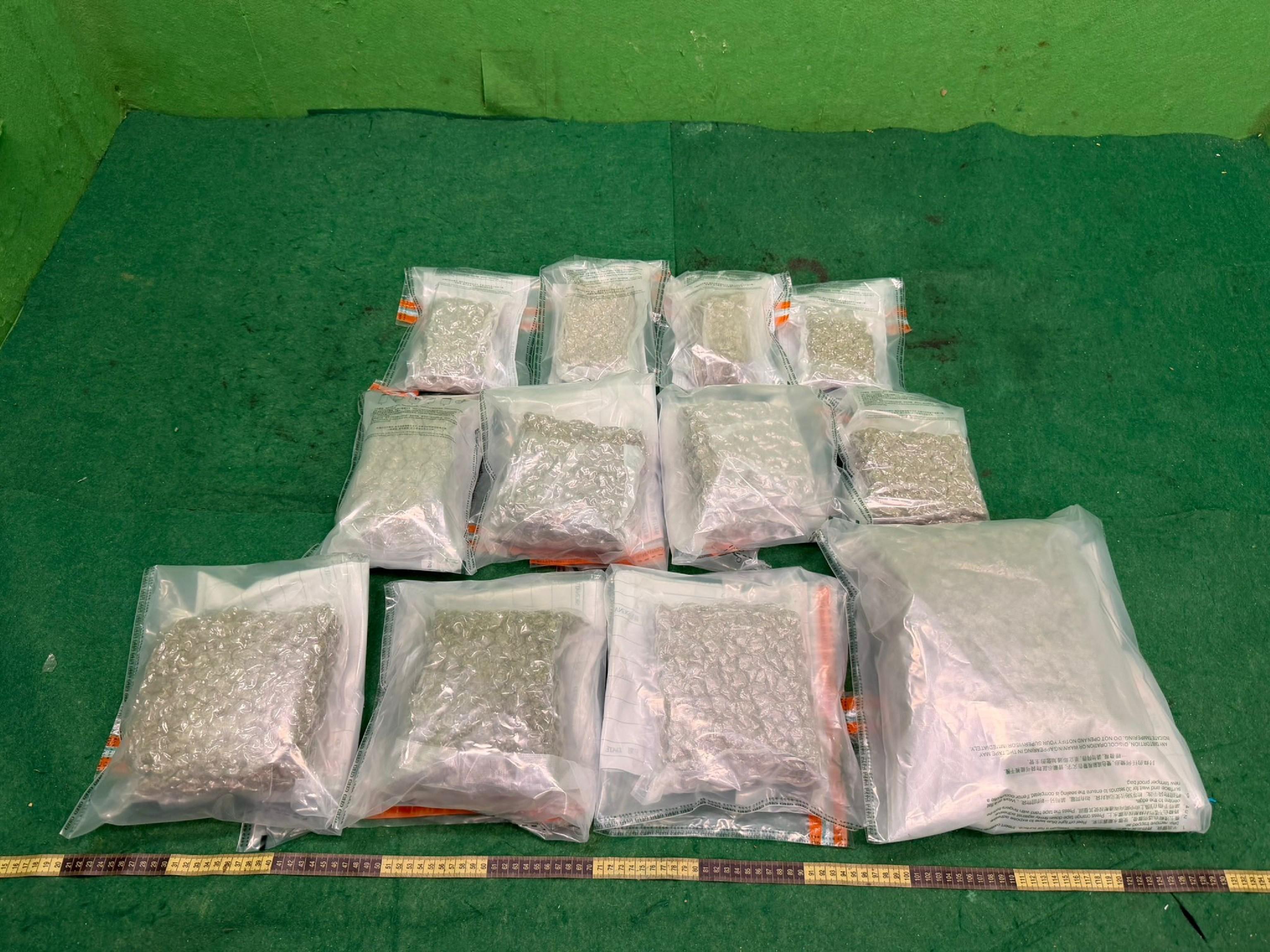 Hong Kong Customs detected a drug trafficking case involving an incoming passenger at Hong Kong International Airport yesterday (February 6) and seized about 5kg of suspected cannabis buds with an estimated market value of about $1 million. Photo shows the suspected cannabis buds seized in the case. 