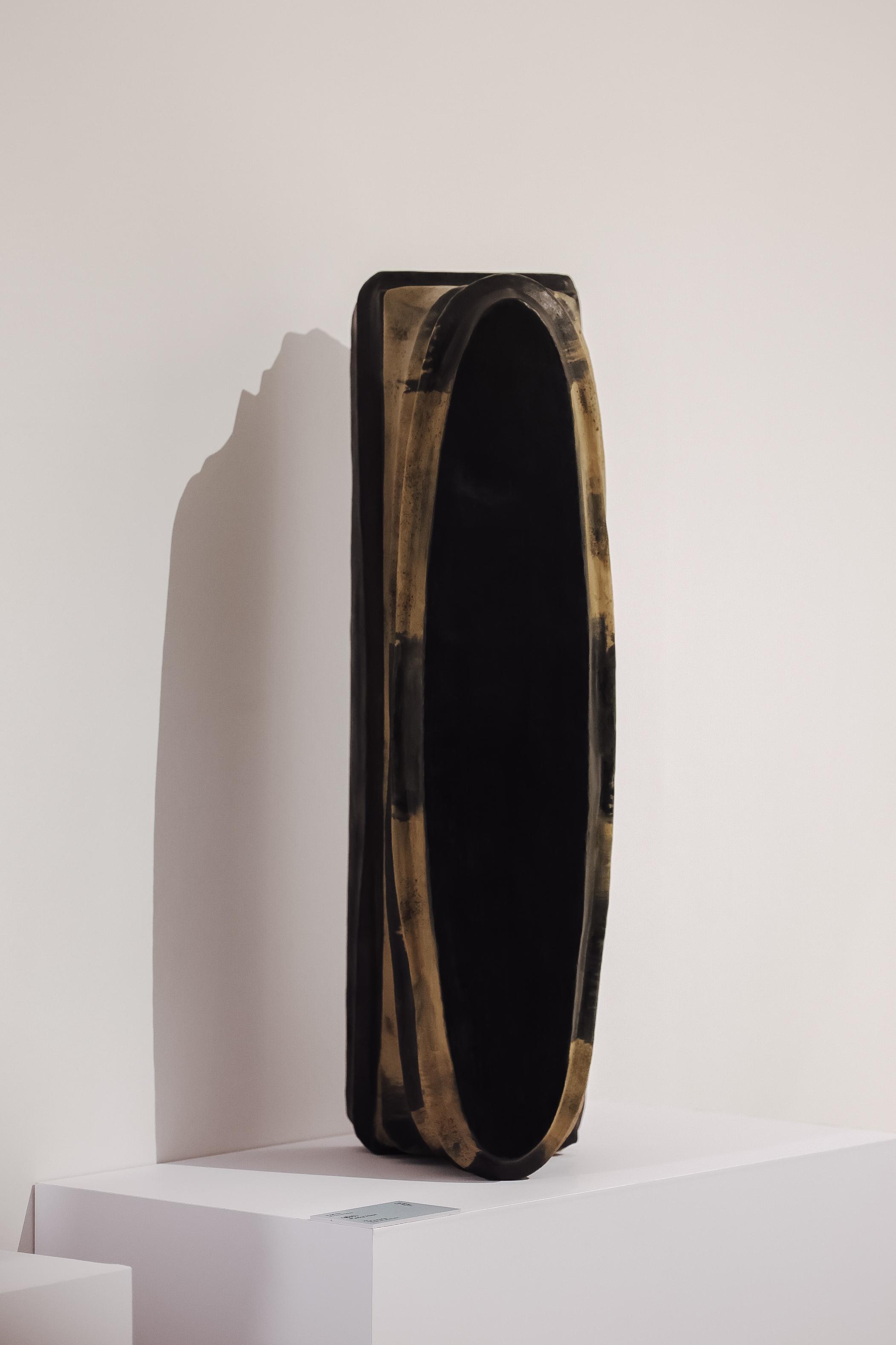 Jointly organised by the Art Promotion Office and the Shenzhen Fringe Art Center, the fourth exhibition "Debate on Form and Spirit" of the "Ink Art Ensembles" Exhibition Series in the Greater Bay Area is on display until March 28 at Xiqiao Mountain Art Museum (Youwei Art Museum) in Foshan. Photo shows Jiangmen artist Ou Tingzhu's lacquer art sculpture "Waning Moon" from the "Shanshui" series.