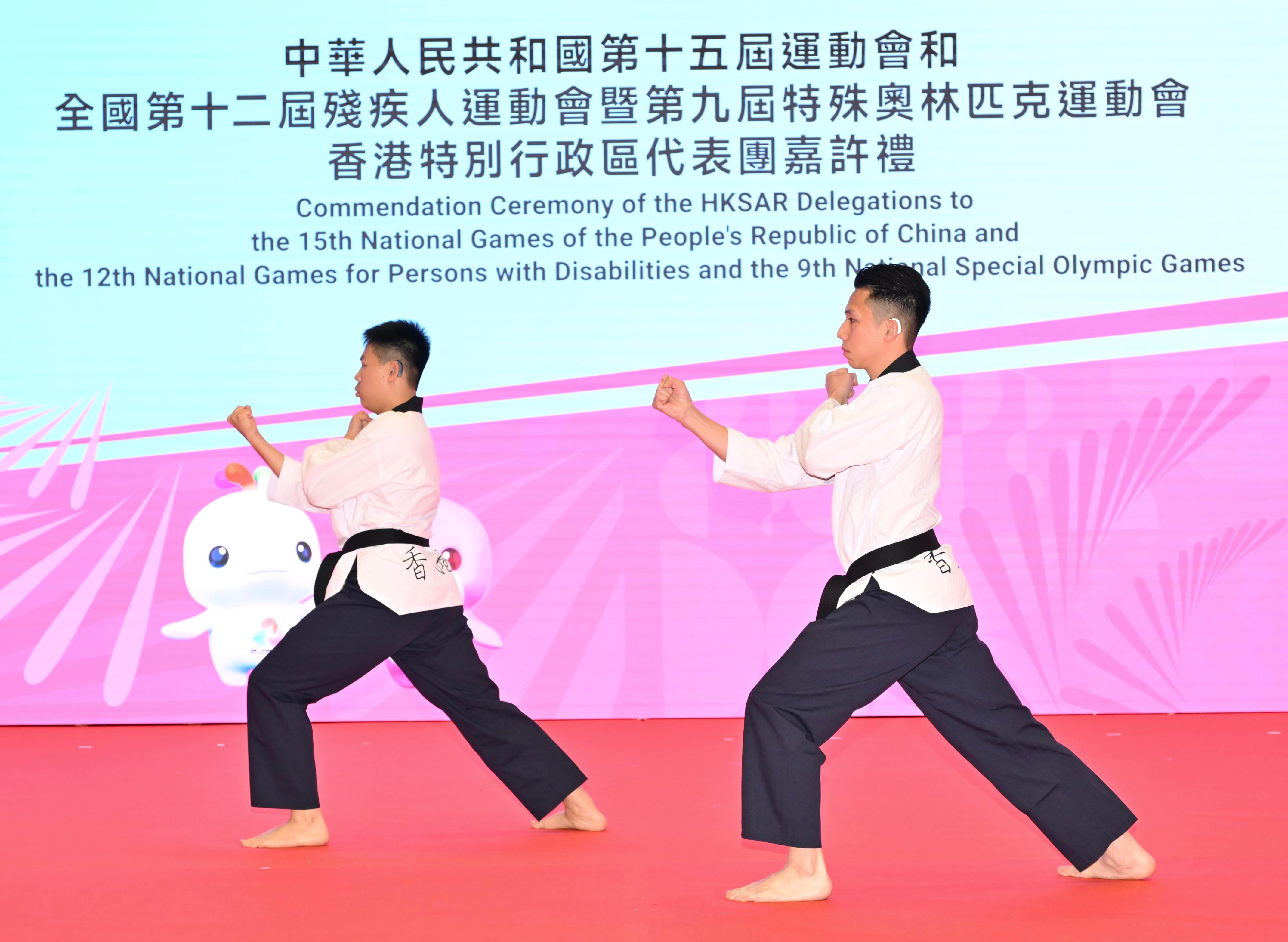 The commendation ceremony for the Hong Kong Special Administrative Region Delegations to the 15th National Games, the 12th National Games for Persons with Disabilities and the 9th National Special Olympic Games of the People&rsquo;s Republic of China was held at the Ma On Shan Sports Centre today (February 12). Photo shows Taekwondo athletes Ho Nim-ching and Lee Pak-shun performing at the ceremony. 